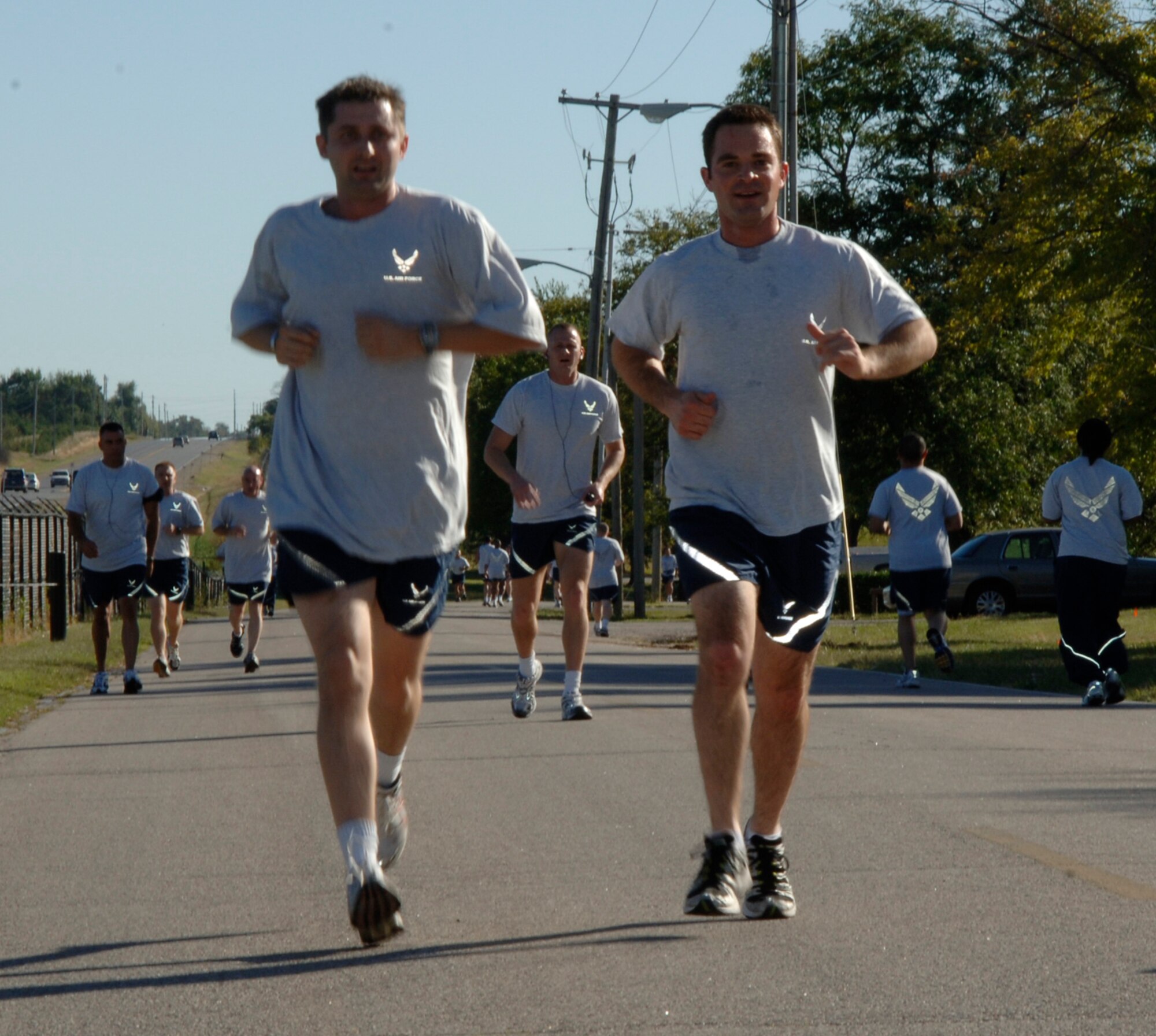 MCCONNELL AIR FORCE BASE, Kan. -- Team McConnell members run for charity at the Combined Federal Campaign 5K Fun Run, Oct. 19. The Fun Run is one of several events McConnell holds throughout the CFC. (Photo by Airman 1st Class Roy Lynch III)