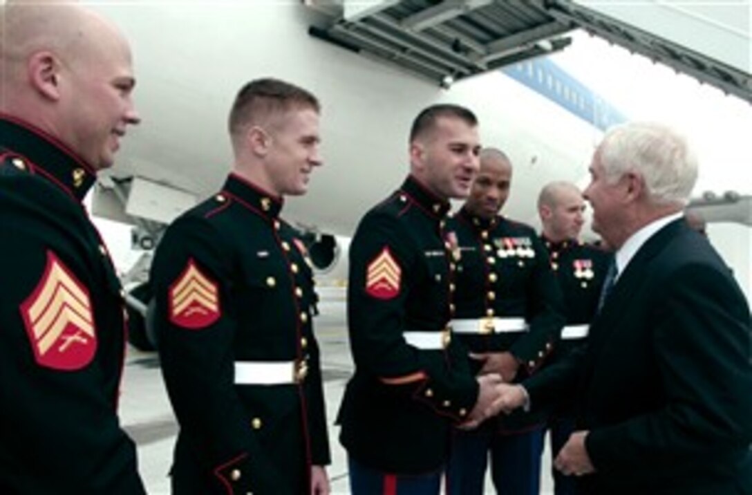Defense Secretary Robert M. Gates meets with Marines from the U.S. Embassy in Amsterdam after attending the informal meeting of NATO-Russia Council Defense Ministers in Amsterdam, Netherlands, Oct. 25, 2007. 