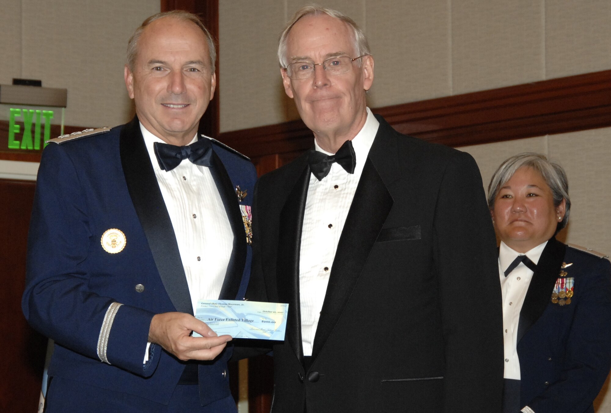 SMC Commander Lt. Gen. Michael Hamel thanks keynote speaker Gen. Thomas Moorman for speaking at this year’s Space and Missile Systems Center’s Dining Out. In appreciation, the men and women of SMC made a donation in Moorman’s name to the Air Force Enlisted Village. (Photo by Lou Hernandez)