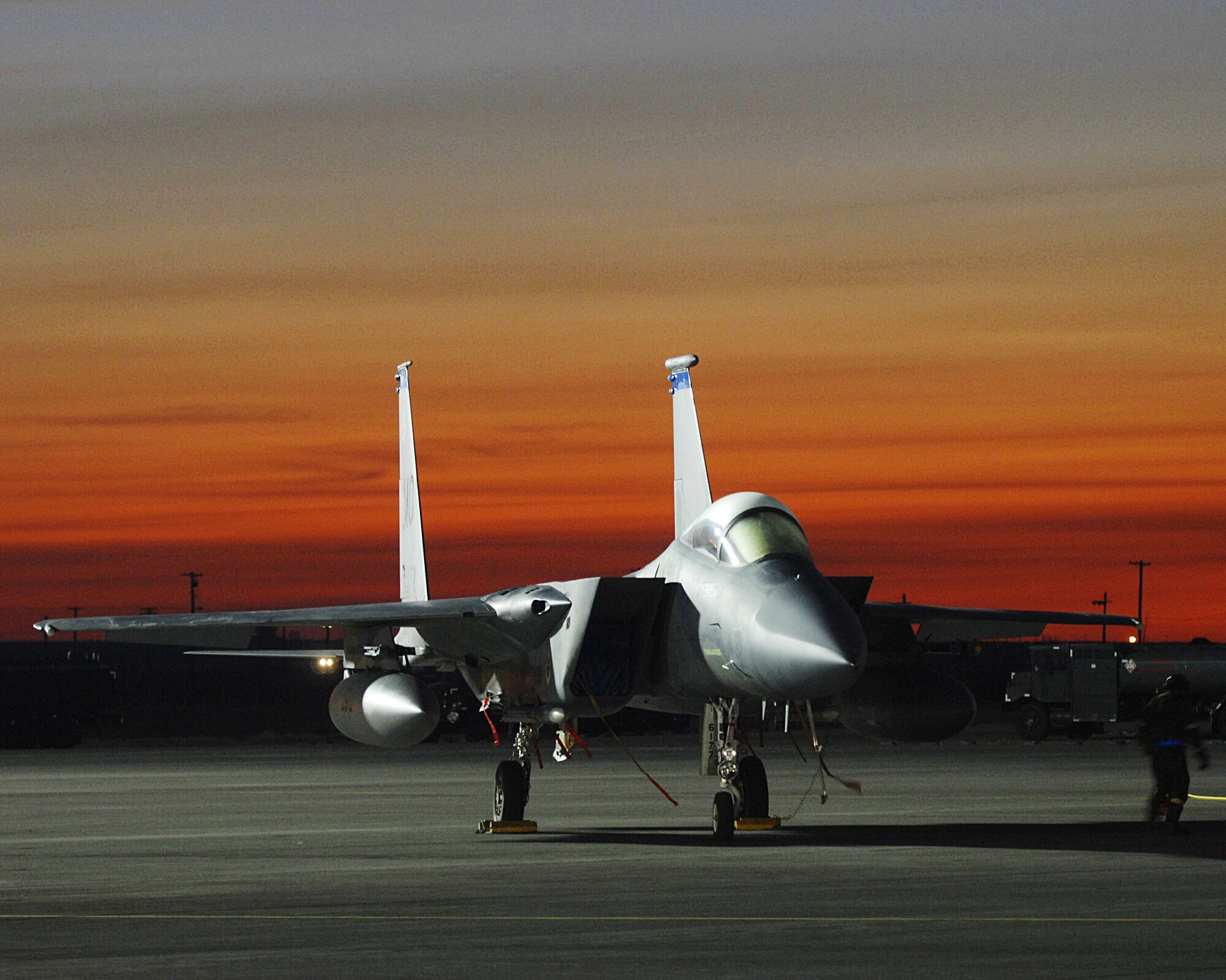 MOUNTAIN HOME AIR FORCE BASE, Idaho -- 366th Aircraft Maintenance Squadron crews work throughout the night preparing jets for launch in the simulated deployed location during Phase II of the exercise here Oct. 25. Each fighter squadron must fly a certain number of missions while in the Phase II portion of the exercise. The 366th Fighter Wing conducts exercises to prepare personnel and equipment for the upcoming March 2008 operational readiness inspection. (U.S. Air Force photo/ Airman 1st Class Ryan Crane)
