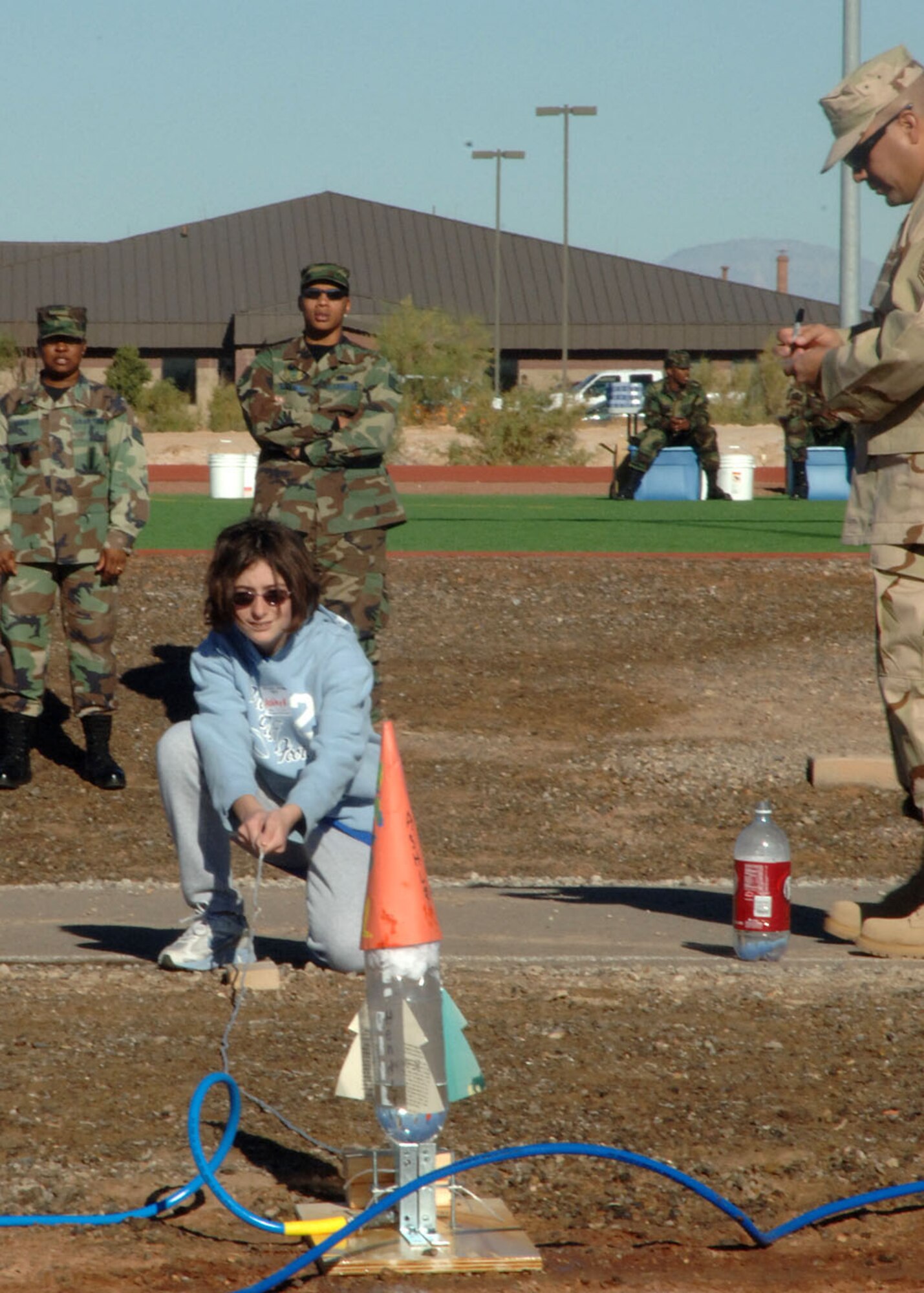 Ashley Henderson of Holloman Middle School prepares to launch her "water rocket", the sixth grade class at Holloman Middle School prepared their own rockets to launch at Holloman’s Air and Space Expo, Oct 26, 2007. The Holloman Air and Space Expo is a showcase of Air Force capabilities, the 49th Fighter Wing mission, and the X Prize Foundation.(US Air Force photo by Airman First Class Tiffany AM Trojca)


