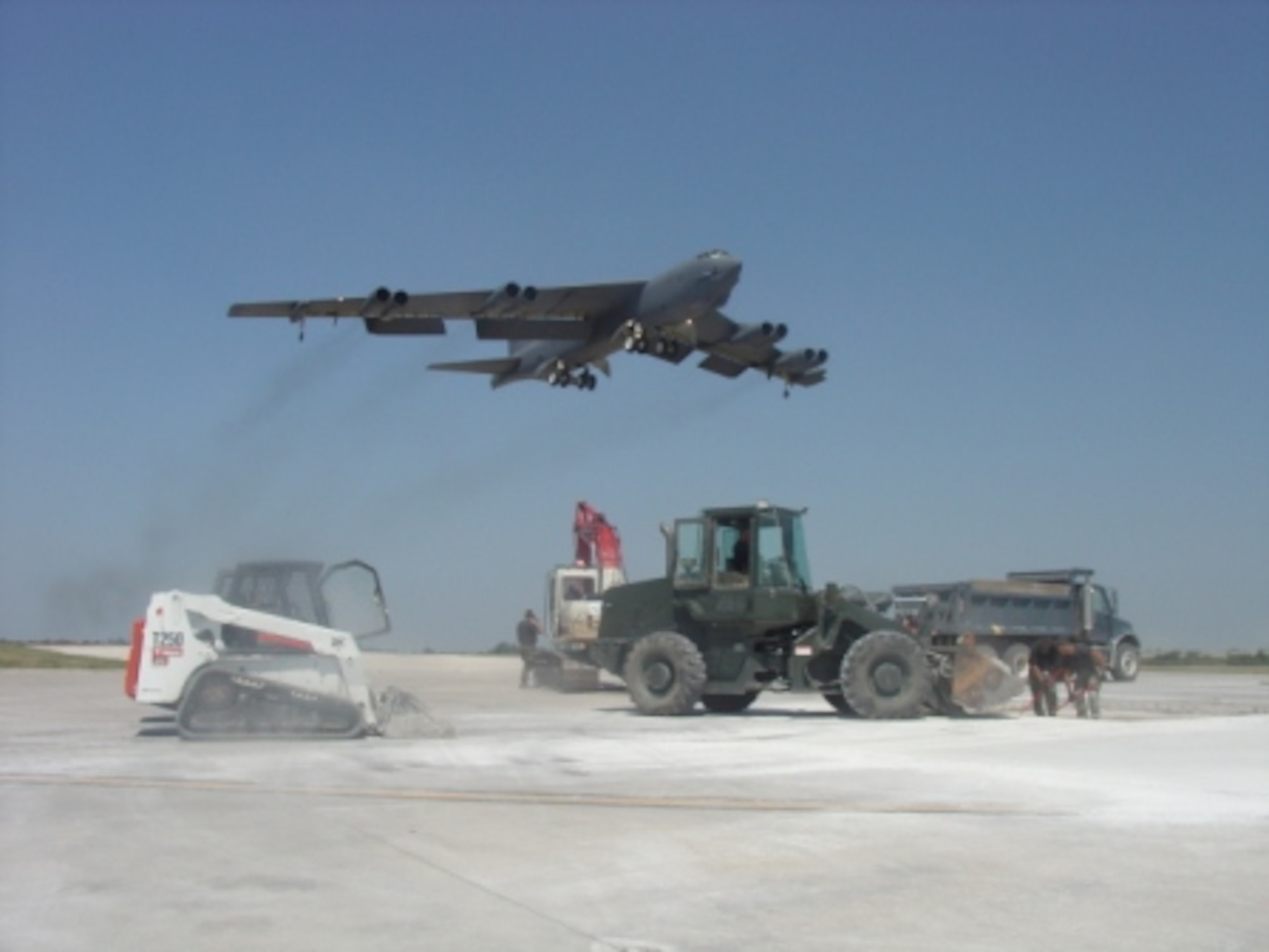 Airman from the 823rd RED HORSE Squadron repair a runway at Whiteman Air Force Base, MO on July 13, 2007. (U.S. Navy photo by Lieutenent JG Meskill)