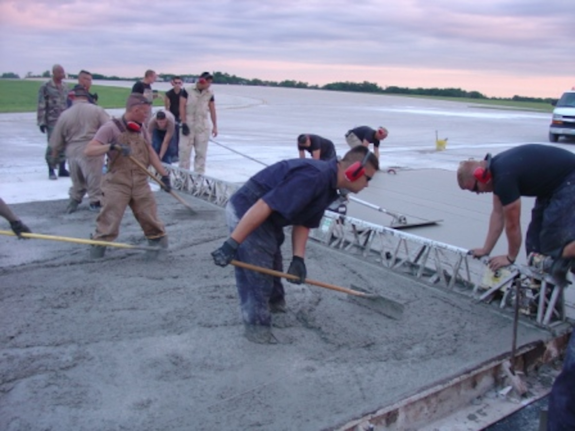 Airman from the 823rd RED HORSE Squadron repair a runway at Whiteman Air Force Base, MO on July 13, 2007. (U.S. Navy photo by Lieutenent JG Meskill)