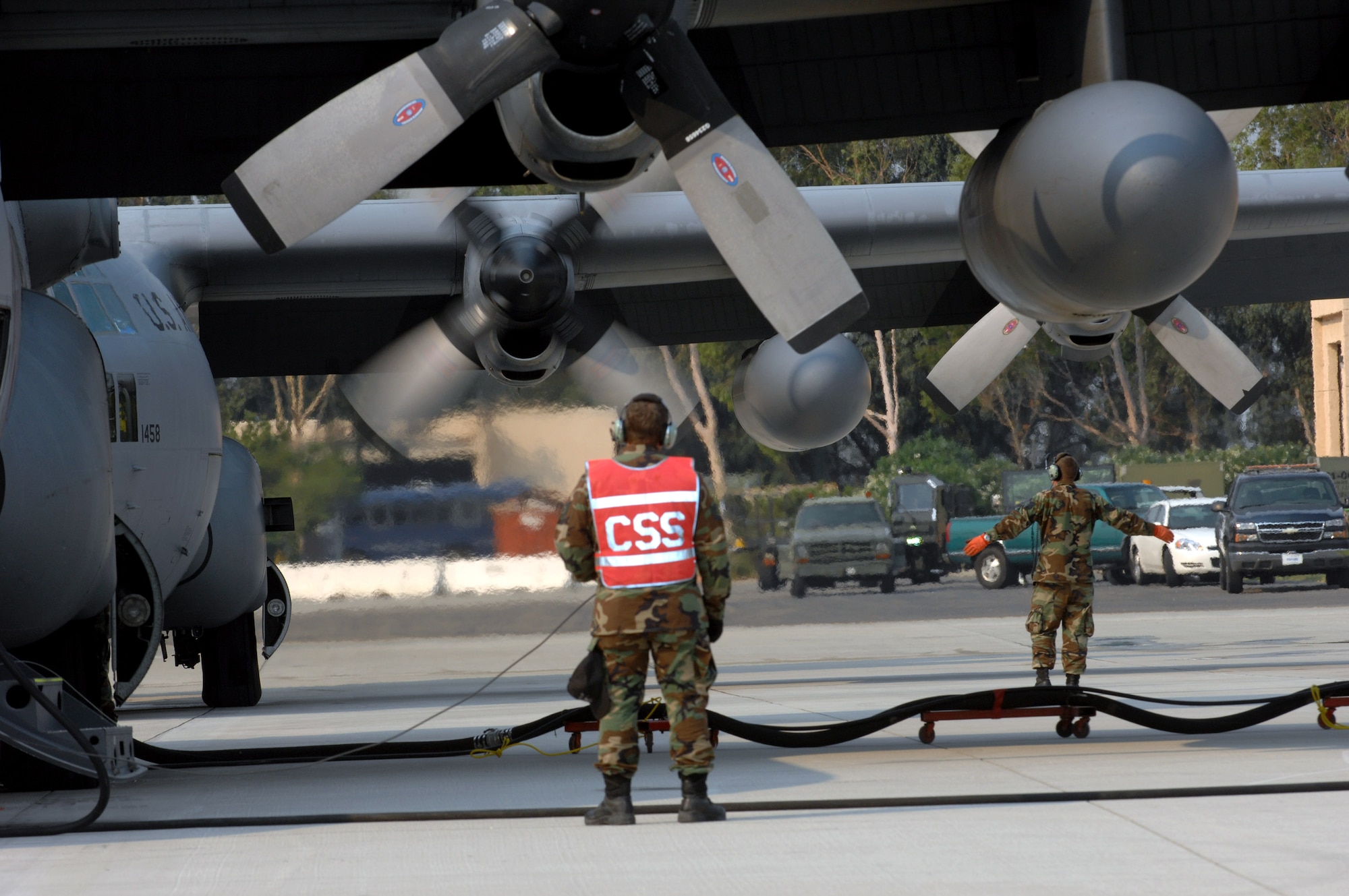 Air Force Reserve Command and Air National Guard Airmen prepare C-130 Hercules aircraft for take off to support the California firefighting efforts Oct. 25 at Channel Islands Air National Guard Base, Calif. (U.S. Air Force photo/Staff Sgt. Hector Garcia) 

