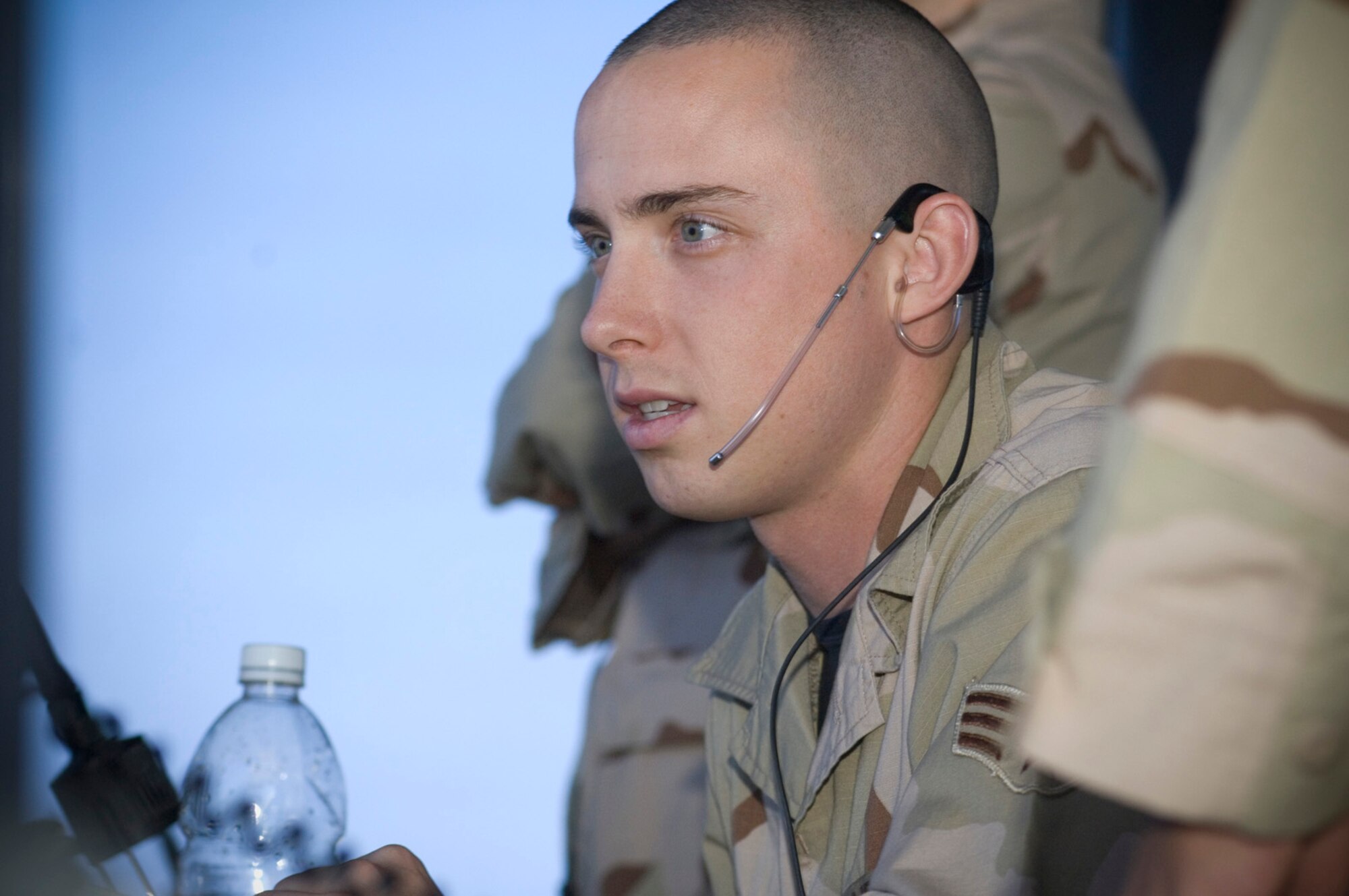 BALAD AIR BASE, Iraq -- Senior Airman Patrick “T-Rex” Trexler, 332nd Expeditionary Operations Support Squadron air traffic controller, monitors an inbound flight here. Airman Trexler is deployed from Eielson Air Force Base, Alaska. (U.S. Air Force photo/Master Sgt. John Nimmo, Sr.)