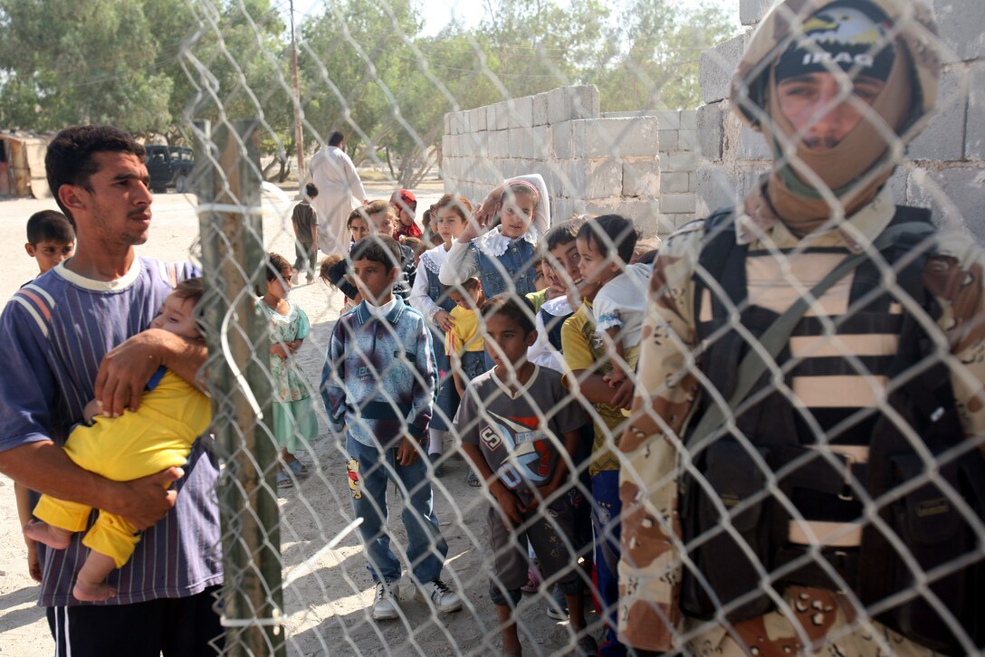KABANI, Iraq (Oct. 27, 2007) ? Children here await their opportunity to receive an examination from Iraqi and U.S. military medical personnel during a cooperative medical engagement. These operations provide an often unavailable treatment to the locals, who cannot easily travel to the major clinics located in the cities.