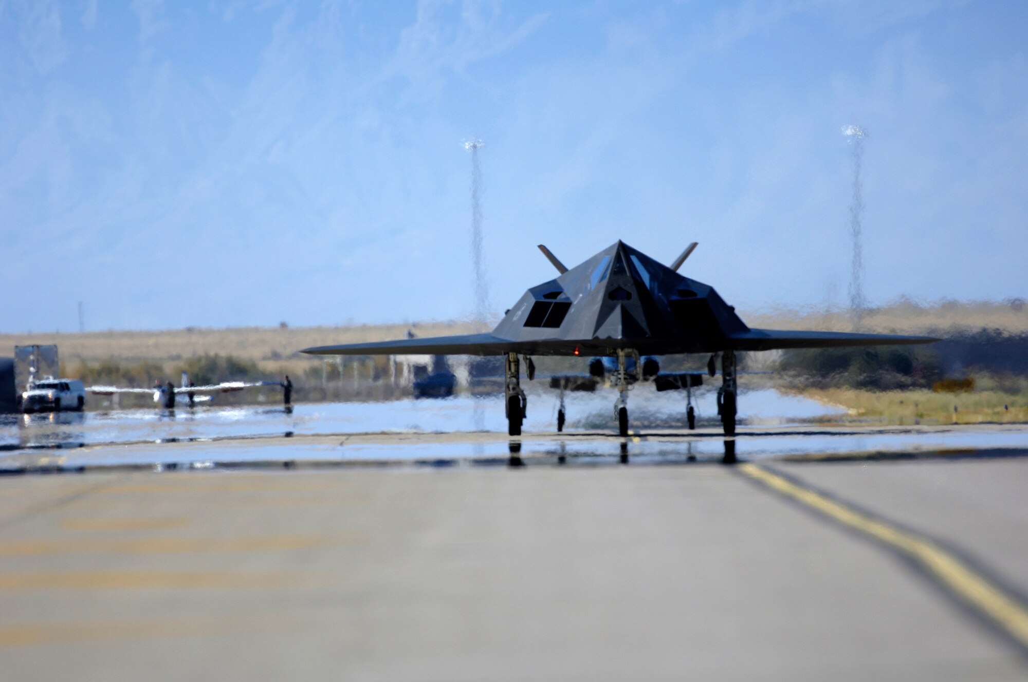 An F-117 Nighthawk taxies down the runway before its flight during the Holloman Air and Space Expo on October 27 2007. The Holloman Air and Space Expo is a showcase of Air Force capabilities, the 49th Fighter Wing mission and the X Prize Foundation (U.S. Air Force Photo by Staff Sgt Jason Colbert)