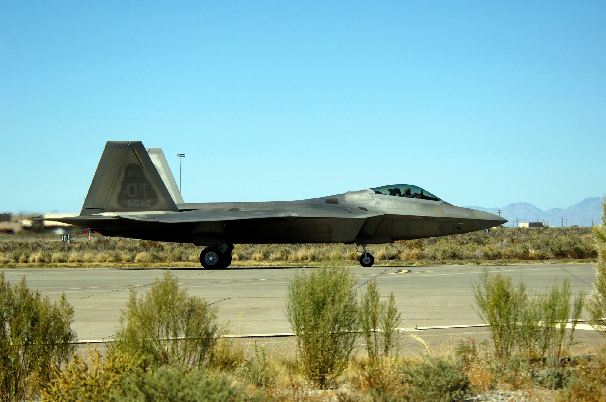 A F-22 Raptor, assigned to Eglin AFB, FL, lands at Holloman AFB, during the Holloman Air and Space Expo on 26 October 2007. NMThe Holloman Air and Space Expo is a showcase of Air Force capabilities, the 49th Fighter Wing mission and the X Prize Foundation (U.S. Air Force Photo by SSgt Jason Colbert)