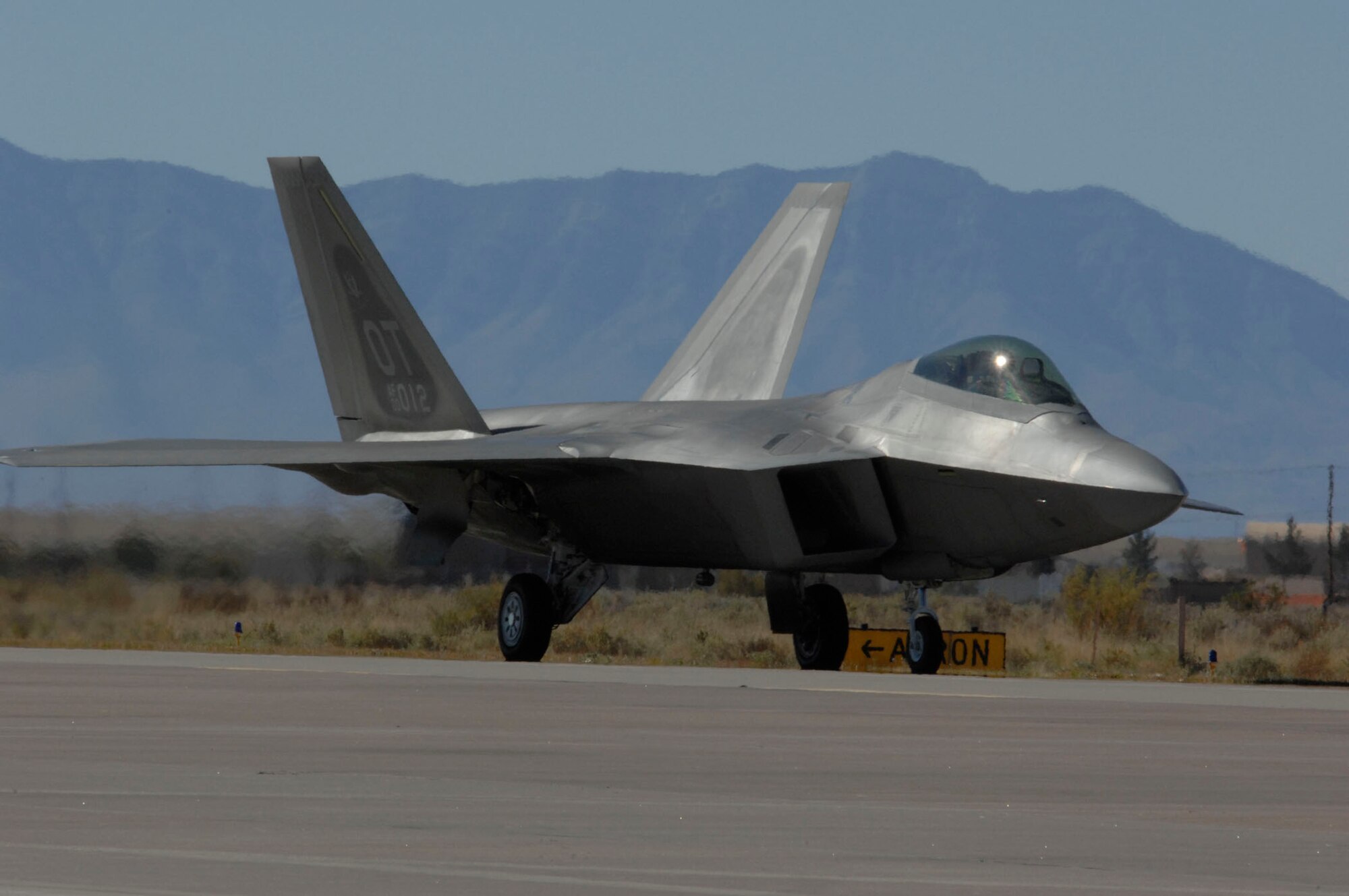The F-22A Raptor taxies onto the flightline after a practice flight during The Holloman Air and Space Expo on Oct. 26. The HASE is a showcase of Air Force capabilities, the 49th Fighter Wing mission, and the X Prize Foundation.(U.S. Air Force photo/Airman 1st Class Rachel Kocin)