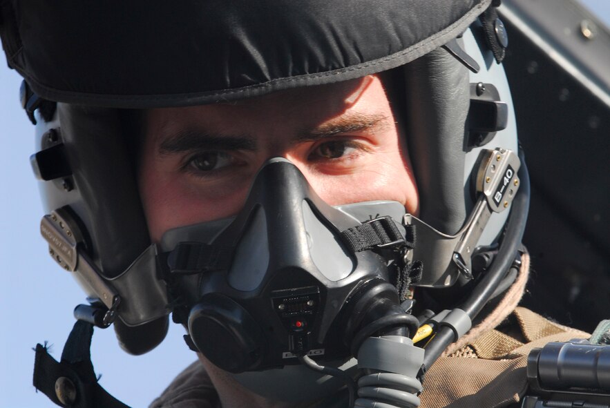 BALAD AIR BASE, Iraq -- Capt. Thomas "Shack" Graham, 4th Expeditionary Fighter Squadron, conducts a communications check with ground maintenance personnel prior to his flight. Captain Graham is deployed from Hill Air Force Base, Utah. (U.S. Air Force photo/Staff Sgt. Joshua Garcia)