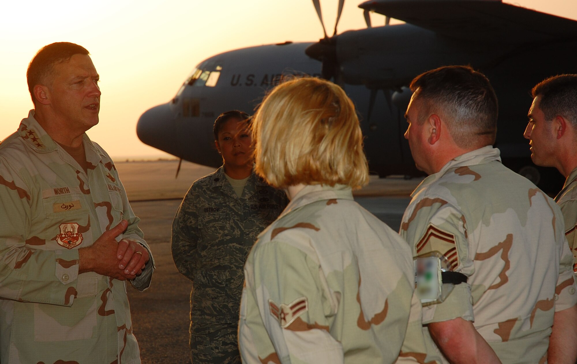 SOUTHWEST ASIA -- Lt. Gen. Gary North, 9th Air Force and U.S. Central Command Air Forces commander, visits with deployed Airmen from the 386th Expeditionary Aircraft Maintenance Squadron at an undisclosed location in Southwest Asia Oct. 25.  General North observed operations and spoke with deployed Airmen from units around the world while visiting the 386 AEW.  (U.S. Air Force photo by Staff Sgt. Tia Schroeder)  


