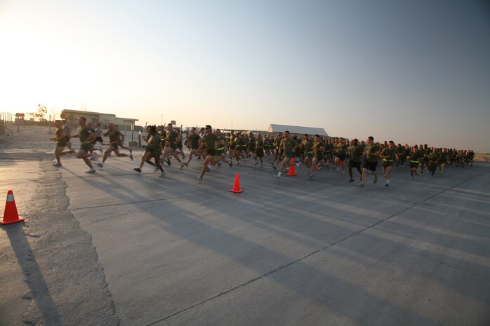 AL TAQADDUM, Iraq (Oct. 28, 2007) ? Nearly 500 service members and civilian contractors blur by the starting line of the Halloween 5k run Oct. 28.