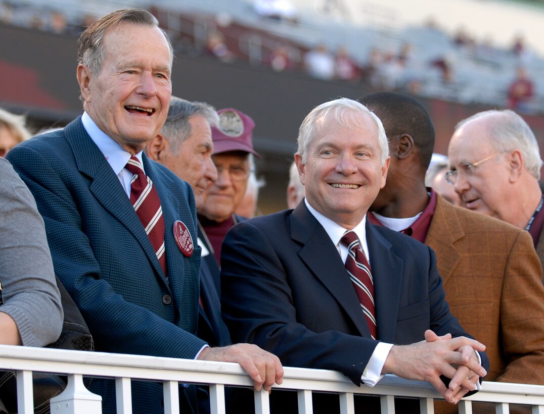 Defense Secretary Robert M. Gates and President George H. W. Bush attend the University of Kansas-Texas A&M  football game in College Station, Texas, Oct. 27, 2007.