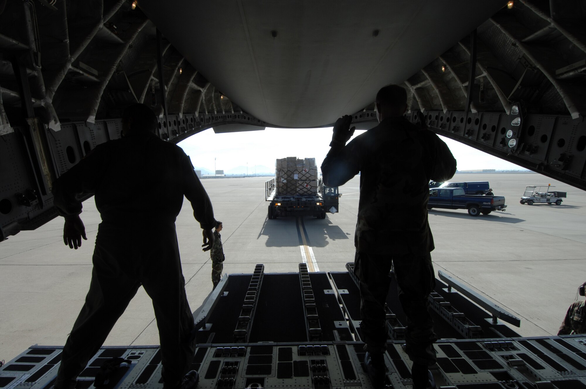 Air and ground crews from the 452nd AMW at March Air Reserve Base, Calif., load medical supplies and equipment from the 375th AES aboard a C-17A Globemaster Sunday October 28, 2007. The 375th is redeploying to Scott AFB, IL. The 375th AES was assigned to the Mobile Aeromedical Staging Facility at March Air Reserve Base, Calif., in support of medical relief efforts for the California wildfires. The 375th along with other aeromedical components from Pope AFB, N.C., and Travis AFB, Calif., were on standby to air-evacuate fire victims out of the local area. U.S. Air Force photo by MSgt Rick Sforza (RELEASED)