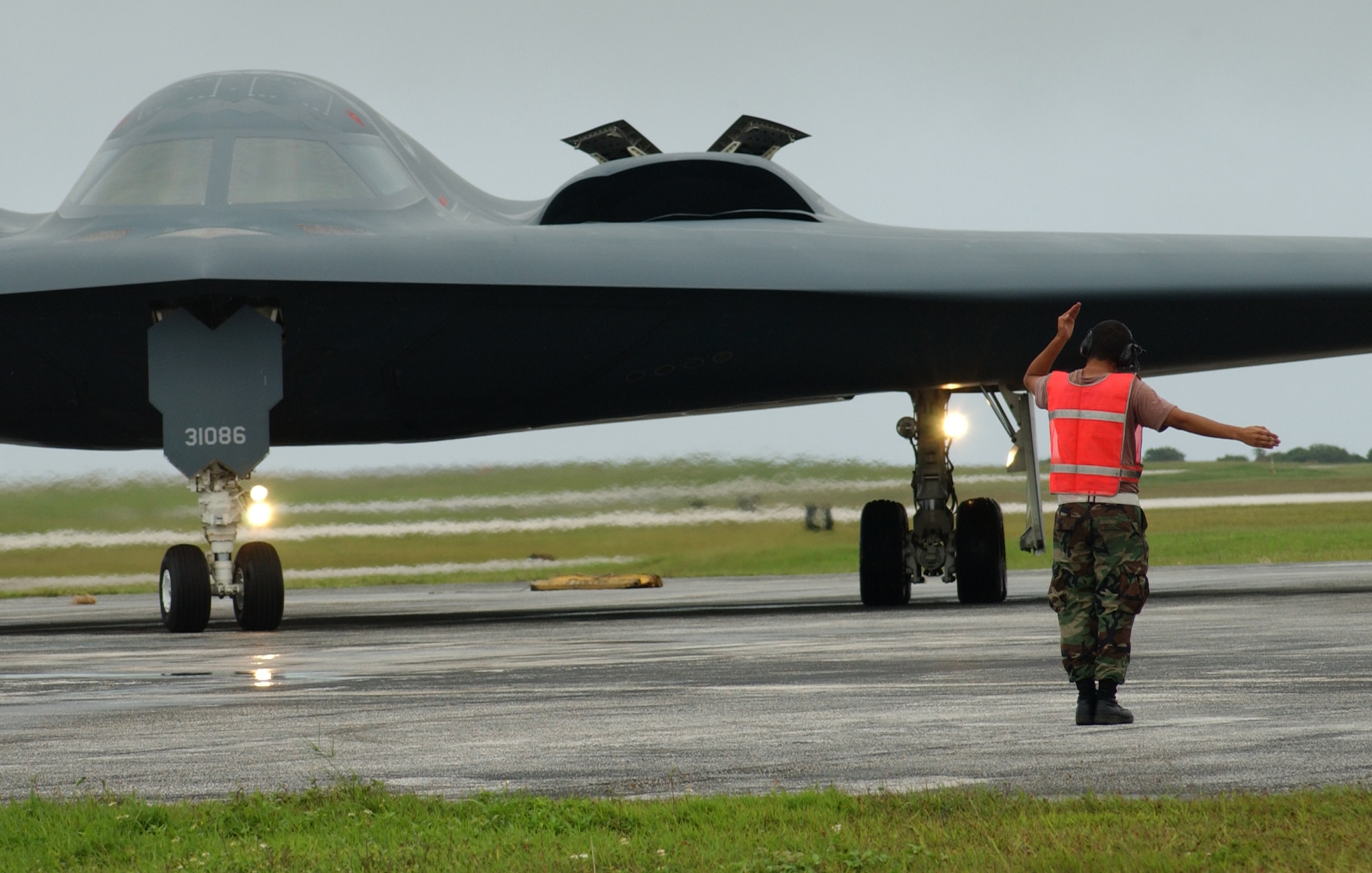This lone crew chief launches the world’s most advanced and lethal bomber on its practice combat sortie. The B-2 Spirit stealth bomber recently participated in a series of ordnance drops on the Pohakuloa Training Area on the big island of Hawaii. They practiced combat operations while working with JTACs on the ground that were calling in the fire from the B-2s (Air Force photo/Senior Airman Brian Kimball)
