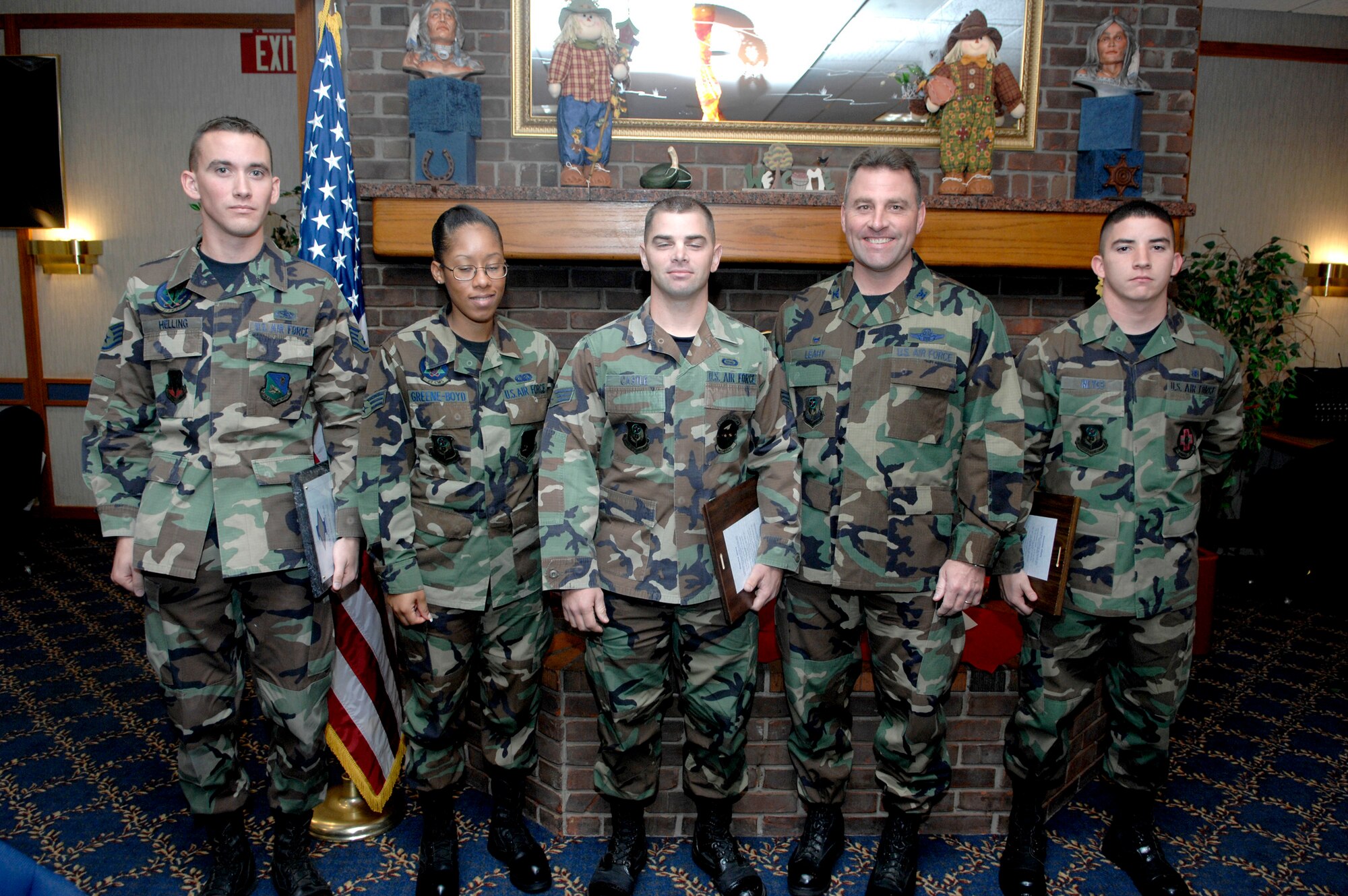 CANNON AIR FORCE BASE, N.M. -- October Diamond Sharp Award winners were congratulated by Col. Tim Leahy, 27th Special Operations Wing commander, at a breakfast on October 21. Receiving awards were (from left) Staff Sgt. Clayton Helling, 712th Maintenance Squadron, Senior Airman Marshe? Greene-Boyd, 27th Special Operations Component Maintenance Squadron, Senior Airman John Castle, 27th  Special Operations Support Squadron, Colonel Leahy, and Airman 1st Class Nicholas Reyes, 27th Special Operations Aeromedical Dental Squadron. (U.S. Air Force photo by Airman 1st Class Eric Cardenas) 
