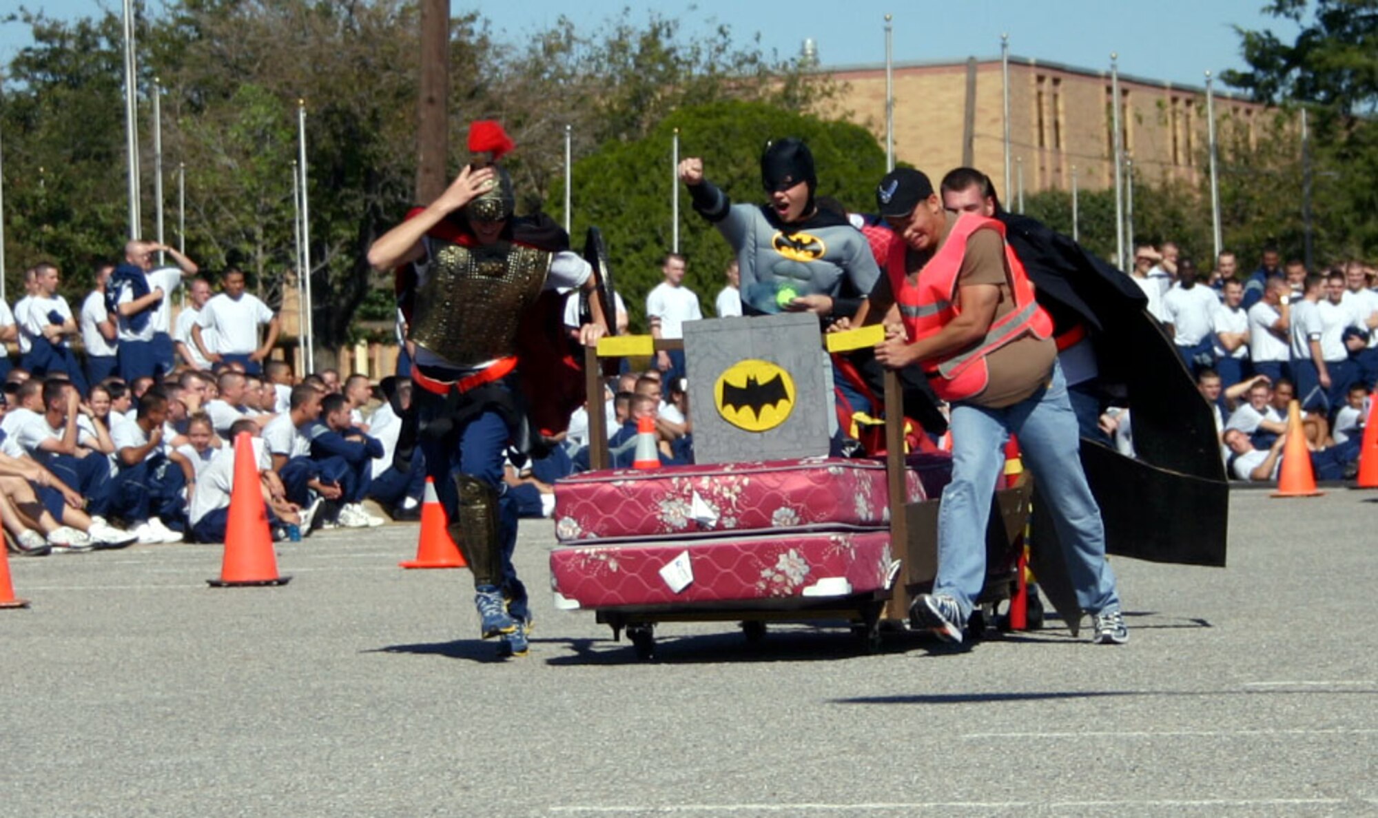 The 360th Training Squadron's "Unsung Heroes" team hits the home stretch during the Bed Race at the Community Activity Center Oct. 27. (U.S. Air Force photo/Staff Sgt. Tonnette Thompson)