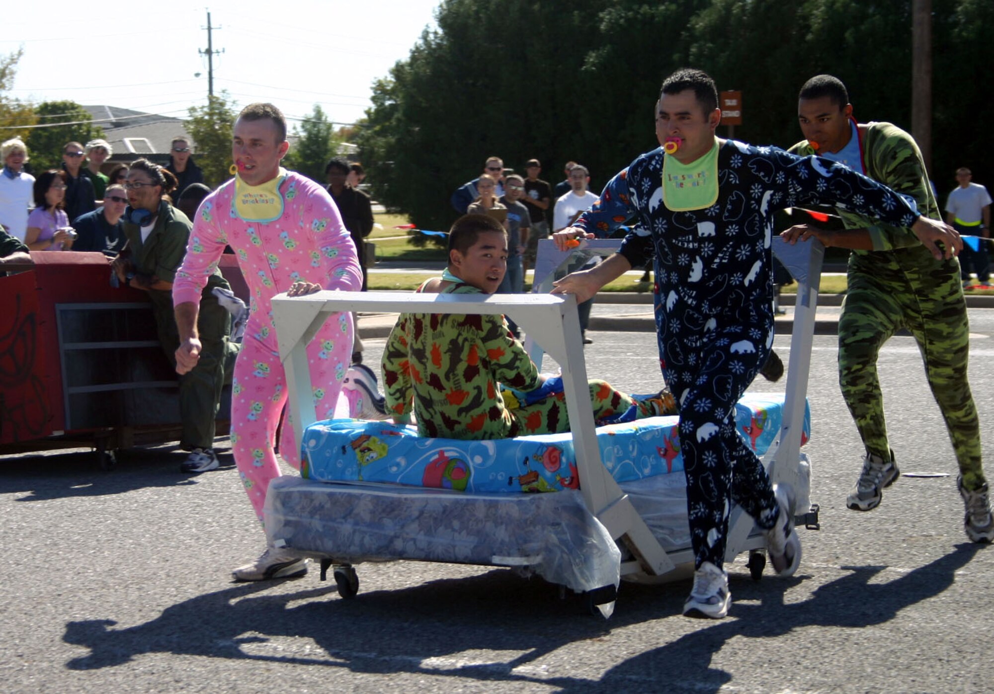 The 365th Training Squadron's "Rugrats" team takes off during the Bed Race at the Community Activity Center Oct. 27. (U.S. Air Force photo/Staff Sgt. Tonnette Thompson)