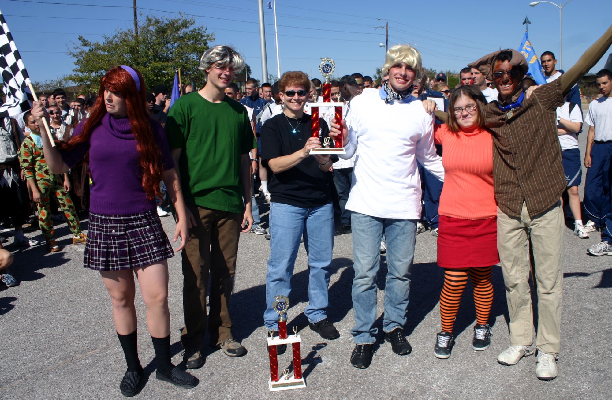 Team Scooby Doo poses with 82nd Training Wing Chief Chief Master Sgt. Jeannie McLean after the Bed Race Oct. 27.  The team won for best costumes and decorations. (U.S. Air Force photo/Staff Sgt. Tonnette Thompson)
