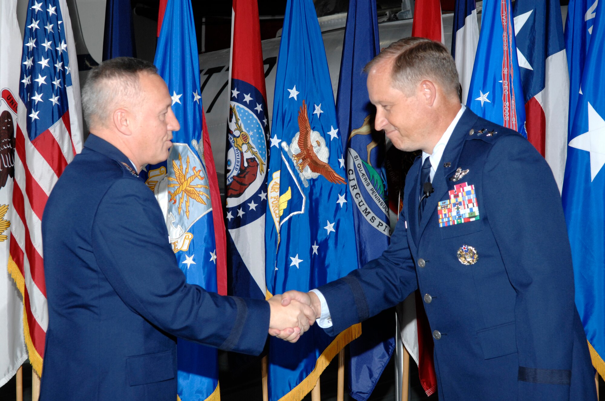 EGLIN AIR FORCE BASE, Fla. -- General Bruce Carlson, Air Force Material Command commander, congratulates Maj. Gen. David Eidsaune during General Eidsaune's promotion ceremony Oct. 26. (USAF photo by Craig McDonnell)