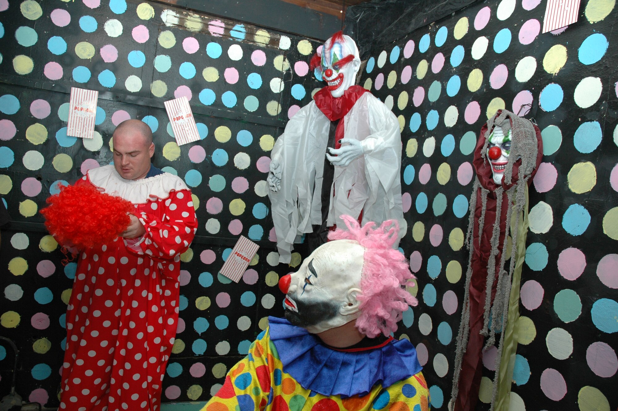 Senior Airman Cody Himes and Staff Sgt. Tim Baxter, both from the 341st Missile Maintenance Squadron, prepare to scare haunted house visitors at the Kranz Haunted House Oct. 19. The 341st MMXS puts on the haunted house annually. (U.S. Air Force photo/Airman 1st Class Emerald Ralston)

