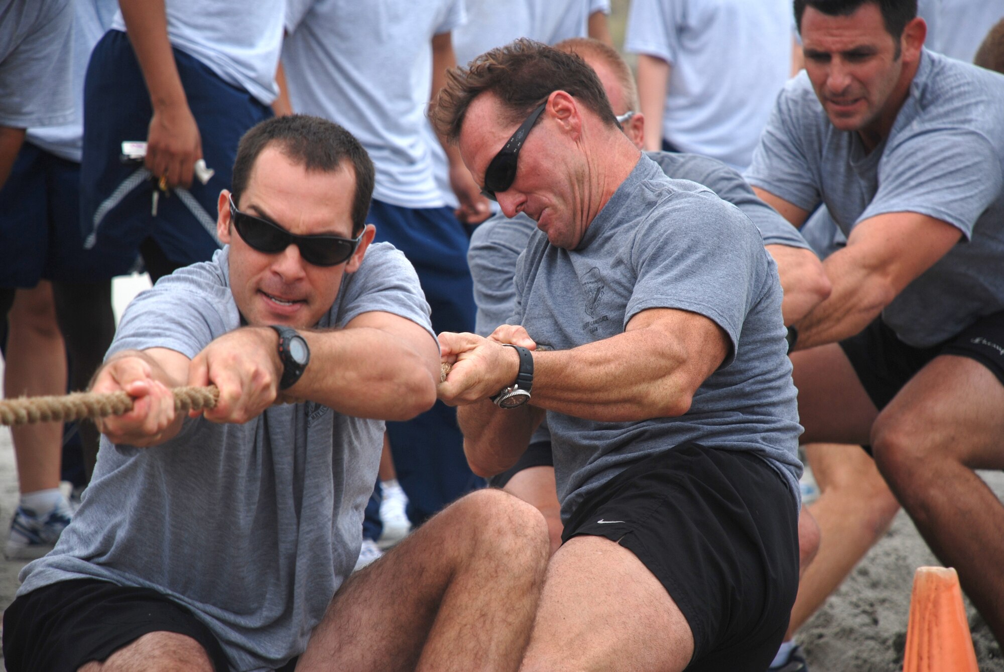Airmen from Team Patrick, the 920th Rescue Wing and 45th Space Wing, enjoyed a day of team sports Friday, Oct. 26.  During one event, pararescuemen from the 920RQW, pulled together to form a tug-a-war team and pulled-their weight in a contest on the beach.  Additionally, the 920th Maintenance Squadron formed a softball team coming in second.  Finally, the 920th Mission Support Squadron placed in the bowling competition. Participants said the event was a lot of fun.