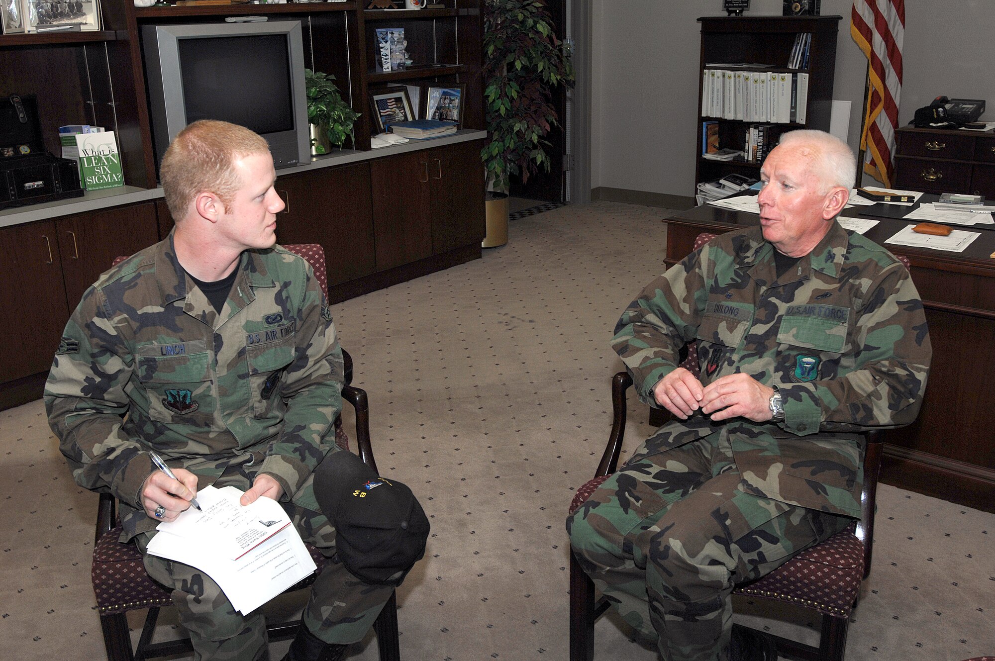 WHITEMAN AIR FORCE BASE, Mo. -- Col. Robert Dulong, 509th Maintenance Group commander, responds to a question from Airman 1st Class Stephen Linch, 509th Bomb Wing Public Affairs, during an interview for a story on the maintenance group’s recent selection as the 2007 Air Combat Command’s Clements McMullen Memorial Daedalian Weapon System Maintenance Trophy. The group will now compete at the Air Force-level. (U.S. Air Force photo/Tech. Sgt. Samuel A. Park) 