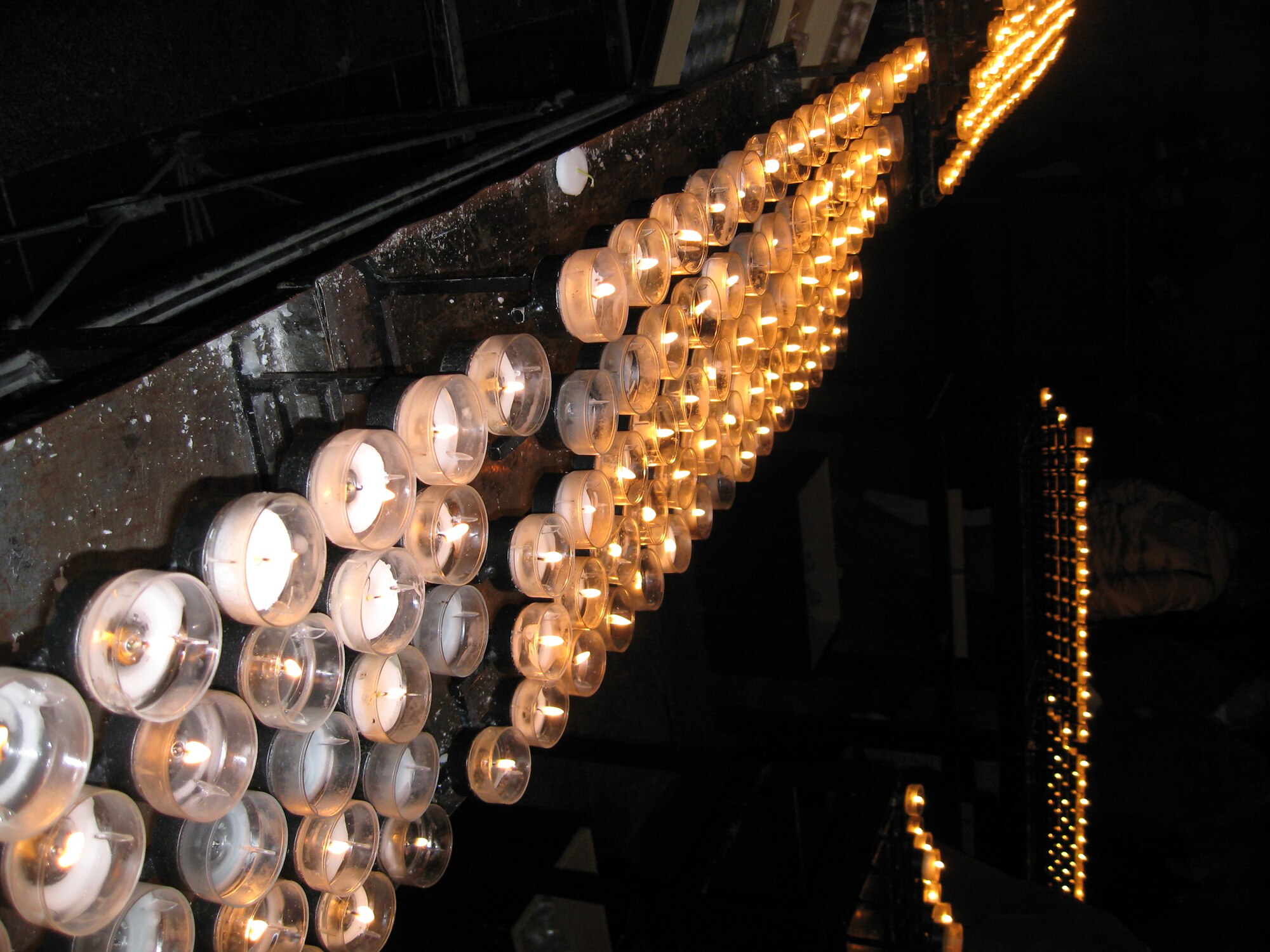 COLOGNE, Germany – Candles burn in the Cologne Dom Cathedral that were lit by visitors on behalf of loved ones. Cologne Dom Cathedral is one of the world's largest churches. The Information, Tickets and Travel office offers a trip to Cologne Nov. 24. (U.S. Air Force photo/Staff Sgt. Tammie Moore)