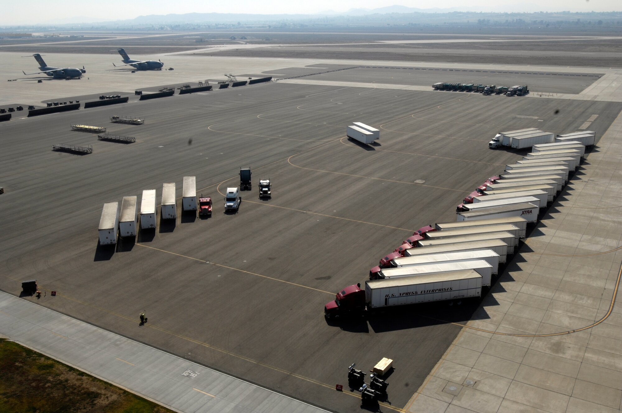 Federal Emergency Management Agency trucks assemble on the flightline of March Air Reserve Base in support of the Southern California firefighting efforts on October 26, 2007. (U. S. Air Force photo by Senior Airman Daniel St. Pierre) 