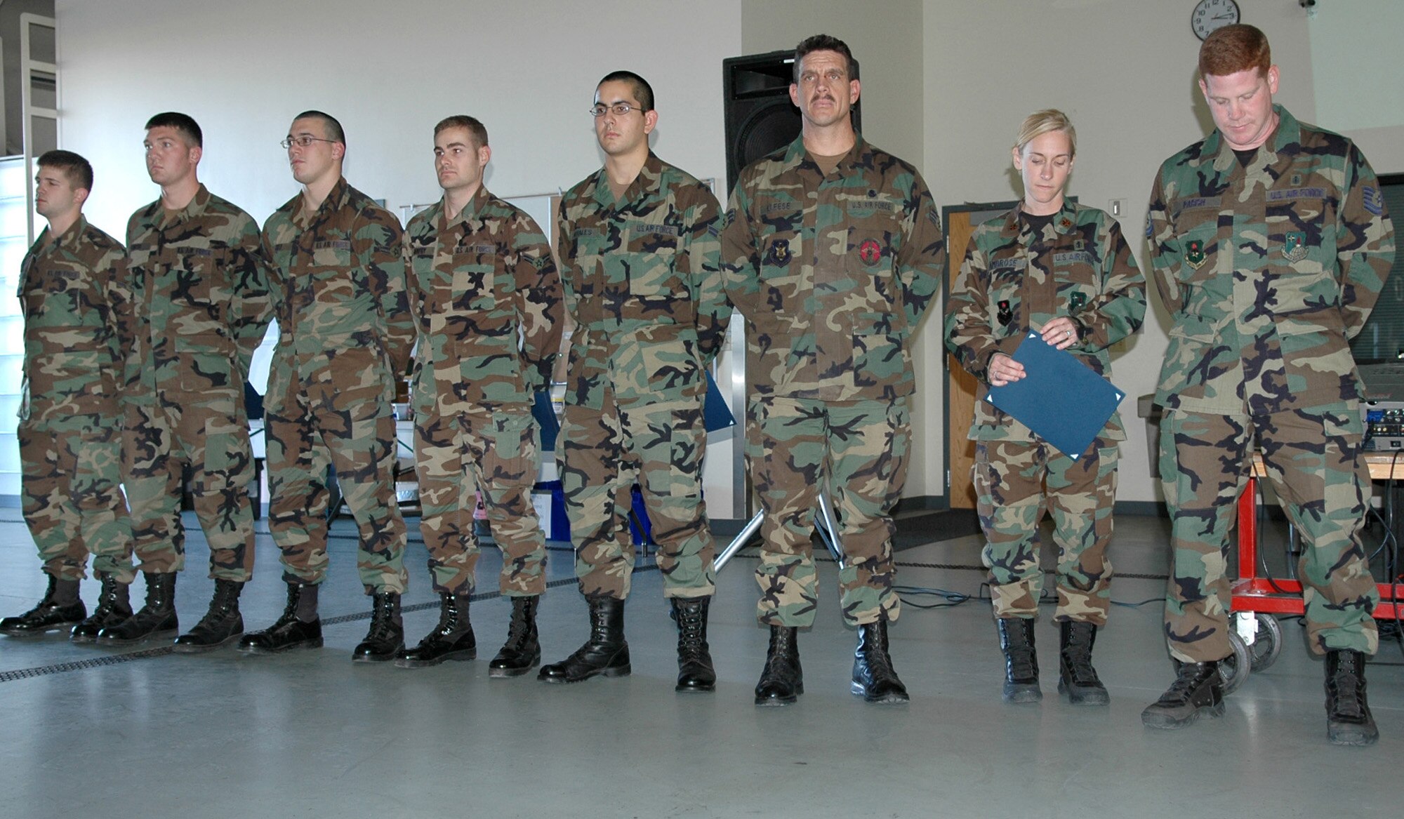 FAIRCHILD AIR FORCE BASE, Wash. -- From left to right, Airman Jonathan Peavy, Airman 1st Class Jason Penrod, Airman 1st Class Joshua Keele, Airman 1st Class Adam Murphy, Airman 1st Class Samuel Morales and Senior Airman Lance Kleese, all from the 66th Training Squadron; and Maj. Michelle Ambrose and Tech. Sgt. John Parish, from 336th Training Support Squadron, receive recognition at the 336th Training Group commander’s call Oct. 26. The Airmen received certificates of appreciation from Capt. Jeff Otis and Lt. Steve Turcott, both from the Washington State Patrol. Not present were Senior Master Sgt. Mike Wisher, Master Sgt. Paul Mikolajczyk, Staff Sgt. George Gonzales, Staff Sgt. John Conant, Staff Sgt. Vincint Girolami, and Senior Airman Travis Mooney, (U.S. Air Force photo / Airman 1st Class Kali L. Gradishar)