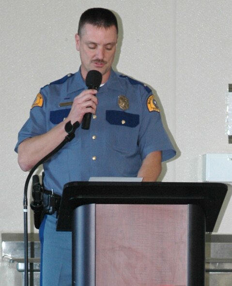 FAIRCHILD AIR FORCE BASE, Wash. -- Washington State Patrol Lt. Steve Turcott, assistant district commander, speaks at the 336th Training Group commander’s call Oct. 26 after providing awards to and shaking the hands of those who provided care to an injured man in a vehicle accident July 18. (U.S. Air Force photo / Airman 1st Class Kali L. Gradishar)