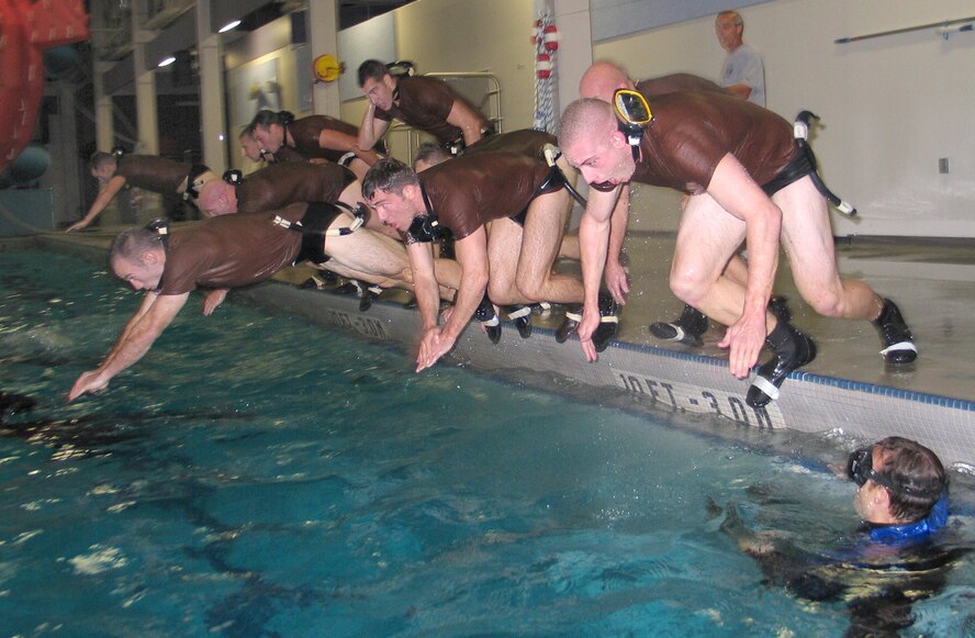 FAIRCHILD AIR FORCE BASE, Wash. – Candidates of Air Combat Command’s Combat Rescue Officer selection program perform pool exercises Oct. 24 here during the water confidence portion of the program. Phase II of the CRO selection program is hosted by Air Mobility Command and the 336th Training Group, and is held twice a year. The most recent class, which ended Oct. 26, started with nineteen candidates. Eight of those candidates finished the intensive week and are now Combat Rescue Officers. (U.S. Air Force photo/Staff Sgt. Connie L. Bias)