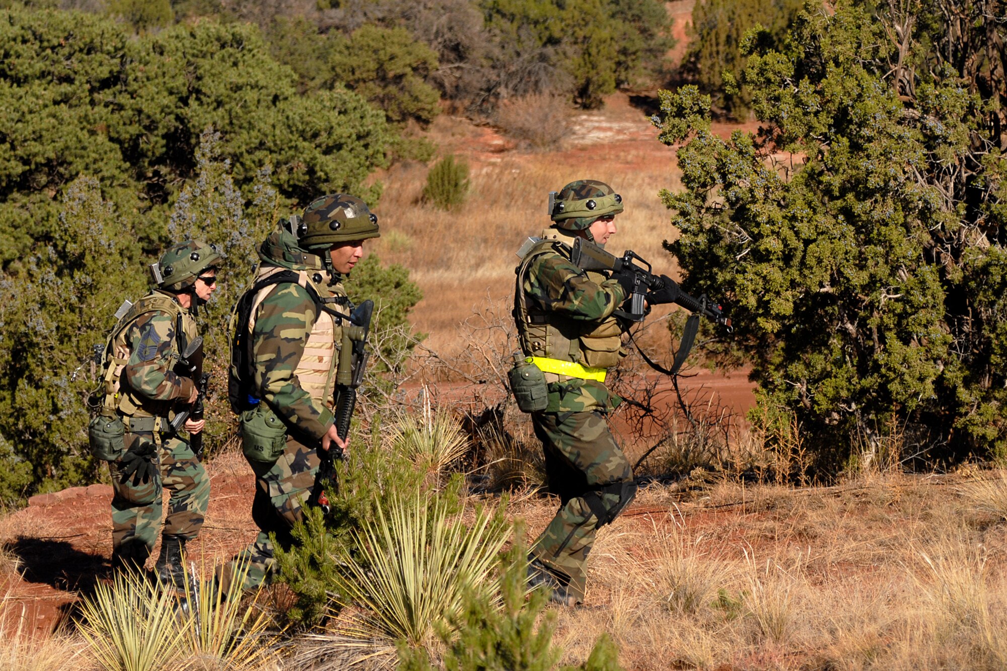 Peterson Airmen went to Fort Carson for Red Devil Oct. 21 to 25. Here they practice patrol techniques, one of the many skills they will depend upon if deployed. (U.S. Air Force photo by Larry Hulst)
