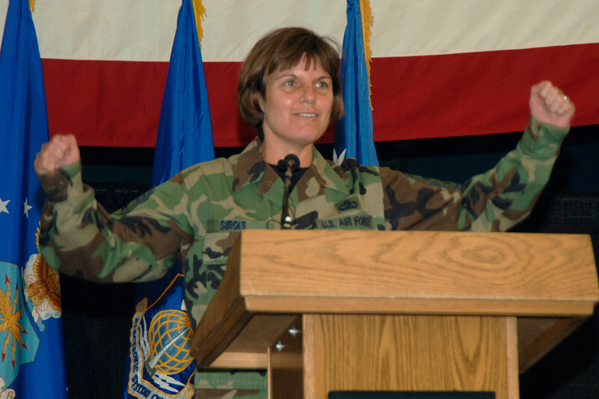 HANSCOM AFB, Mass. -- Chief Master Sgt. Lisa Sirois recites the Airmen’s Creed during the Operational Readiness Inspection Pep Rally earlier this year. Chief Sirois, who has served as the 66th Air Base Wing and Electronic Systems Center command chief since October 2005, prepares to leave Hanscom in November for a year-long short tour to Manas Air Base, Kyrgyzstan. (U.S. Air Force photo.)