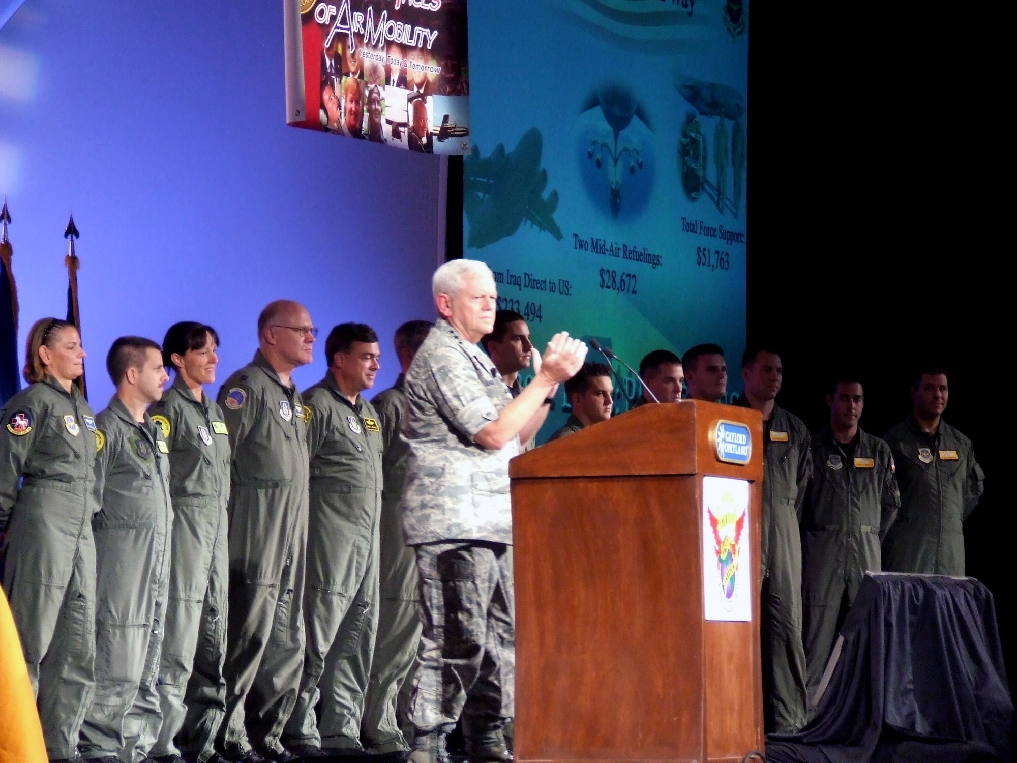 Gen. Arthur J. Lichte, Air Mobility Command Commander, applauds aircrew personnel responsible for a "priceless" aeromedical evacuation mission that saved the life of two U.S. Army soldiers during his presentation at the 2007 Airlift/Tanker Association Convention in Nashville, Tenn., Oct. 27.  General Lichte's presentation was the final presentation for the convention.  (U.S. Air Force Photo/Tech. Sgt. Scott T. Sturkol) 