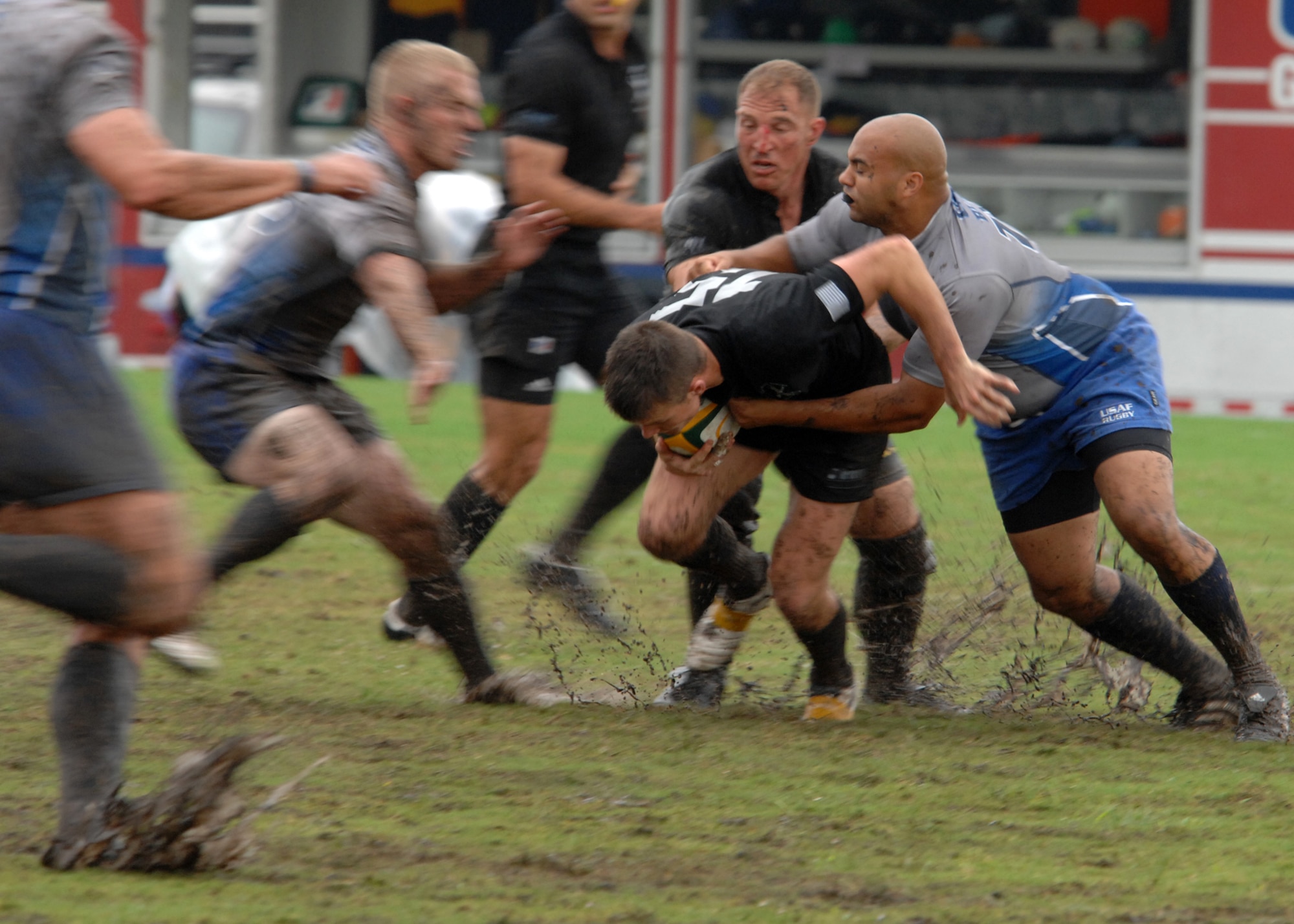 MARINE CORPS BASE CAMP LEJEUNE, N.C. - Staff Sergeant Michael R. Hancock tackles an Army player during the 2007 Armed Forces Rugby Tournament, October 27. Air Force defeated Army 22-5, giving them their fourth consecutive championship. (U.S. Air Force photo by Airman 1st Class Greg C. Biondo)