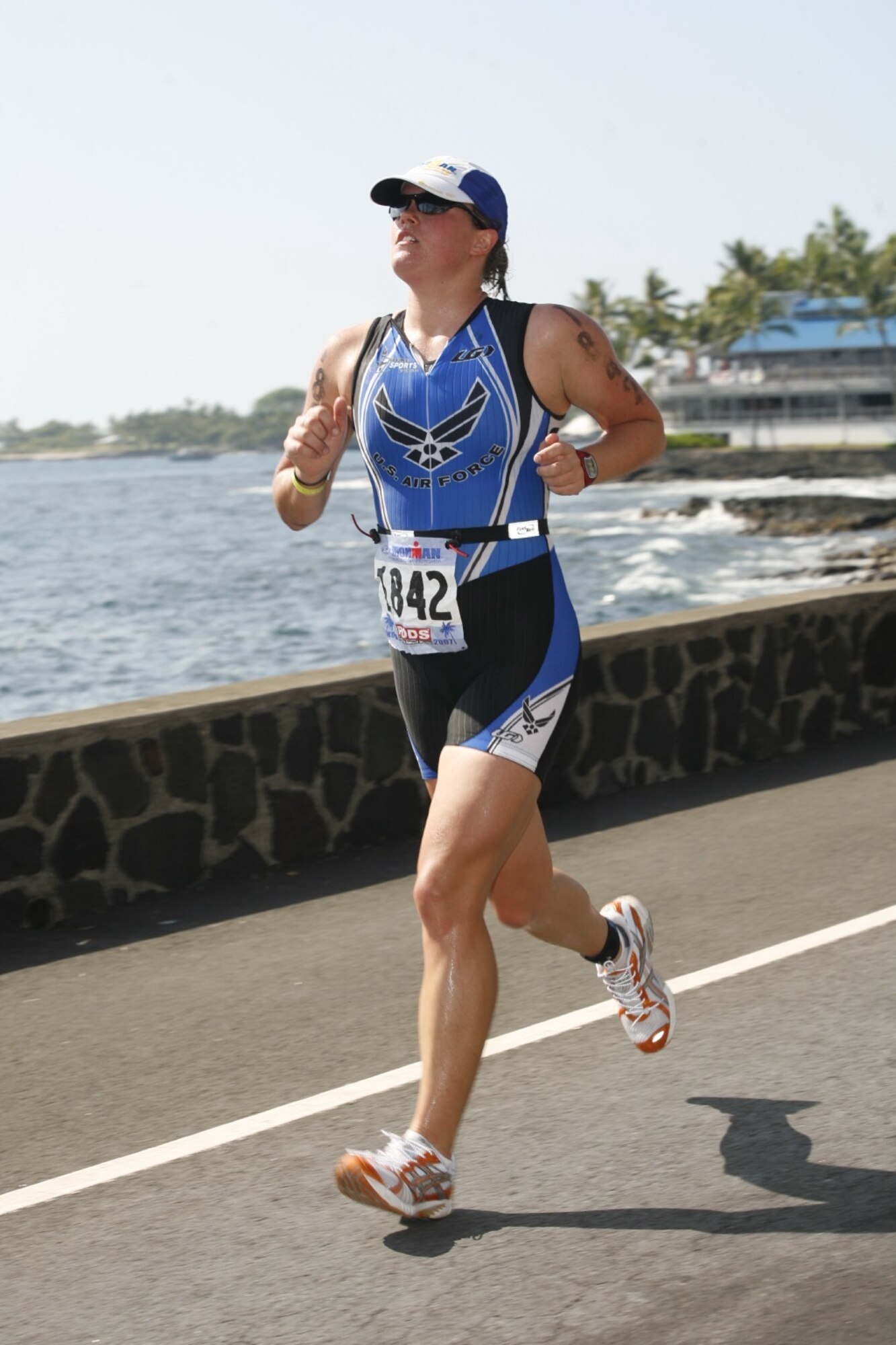 First Lt. Lisa Newman-Wise takes on the road as she battles her way to completing the Ford Ironman World Championship Triathlon held in Kailua Kona, Hawaii, Oct. 13. Lieutenant Newman-Wise was selected by the Air Force to compete with three other Airmen in the triathlon. (Courtesy photo)