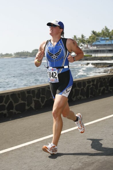 First Lt. Lisa Newman-Wise takes on the road as she battles her way to completing the Ford Ironman World Championship Triathlon held in Kailua Kona, Hawaii, in mid-October. Lieutenant Newman-Wise was selected by the Air Force to compete with three other Airmen in the triathlon. (Courtesy photo)