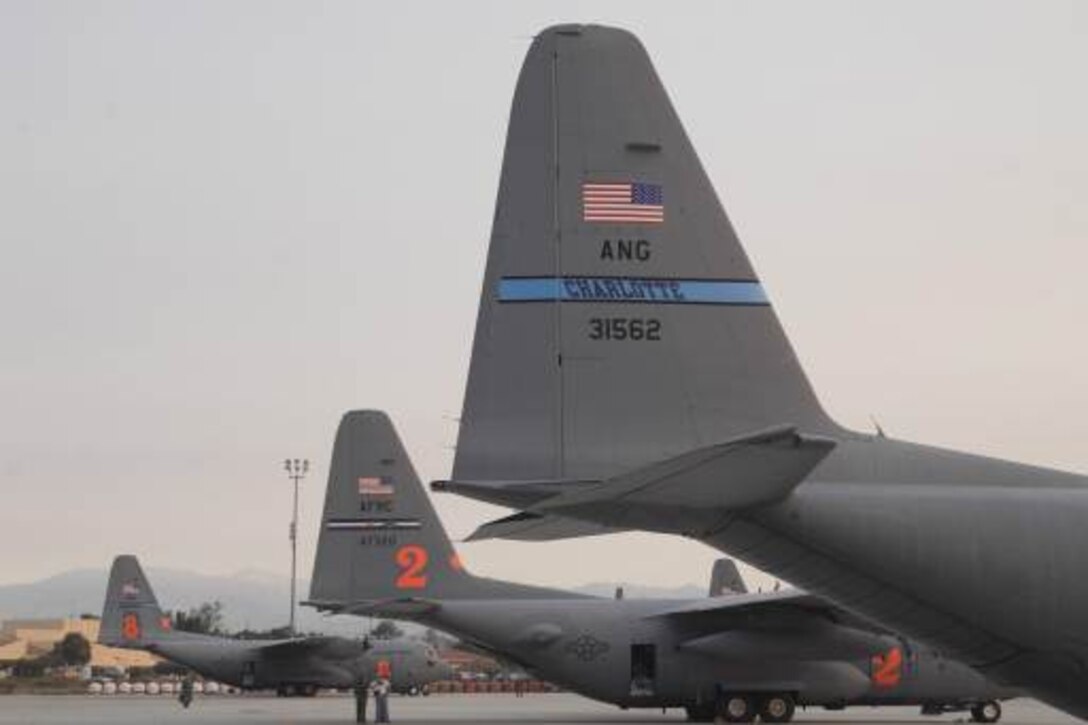 Modular Airborne Firefighting System units from around the country converged at the Channel Islands Air National Guard Station in Port Hueneme, Calif., to help fight the wild fires burning over parts of Southern California. Participating units include The 302nd Airlift Wing from Colorado Springs, Colo.  The 145th Airlift Wing from Charlotte, N.C., and The 153rd Airlift Wing from Cheyenne, Wyo. (U.S. Air Force photo by Tech. Sgt. Alex Koenig)