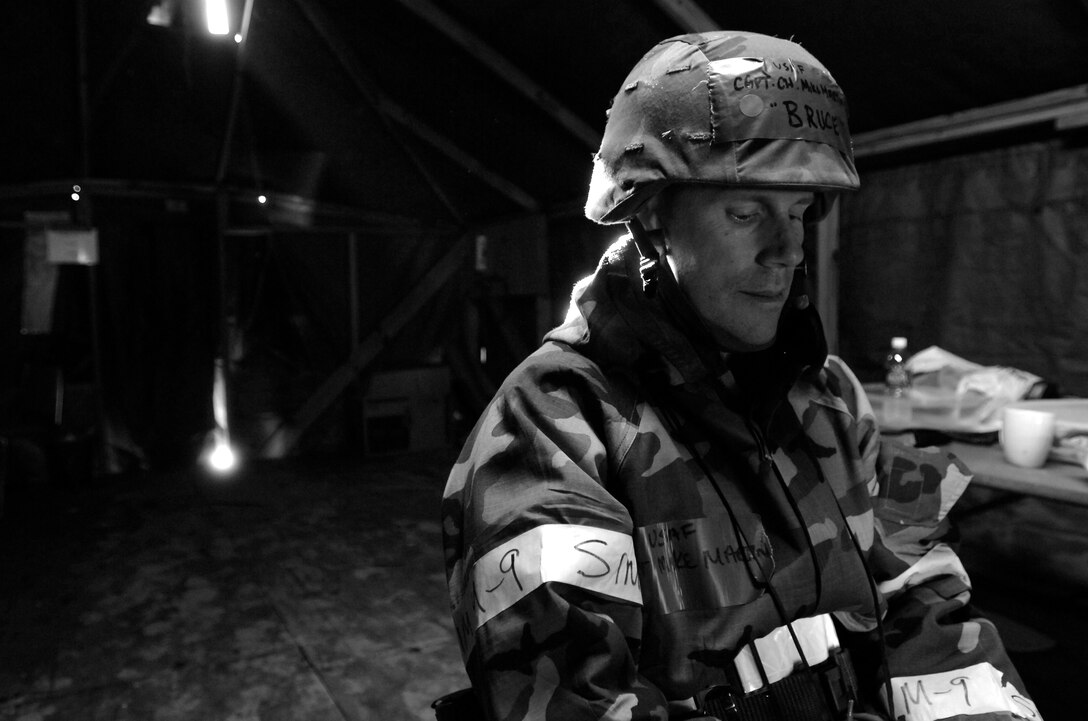 LANGLEY AIR FORCE BASE, Va. -- "To Honor the dead" said Chaplain (Capt.) Mike Martin about his mission as he recalls his deployment in Iraq and how it relates to what he does during the Phase II exercise Oct. 31. The Phase II exercise trains Airmen to deal with various wartime contingencies in a simulated environment.   (U.S. Air Force photo/Senior Airman Christopher L. Ingersoll)