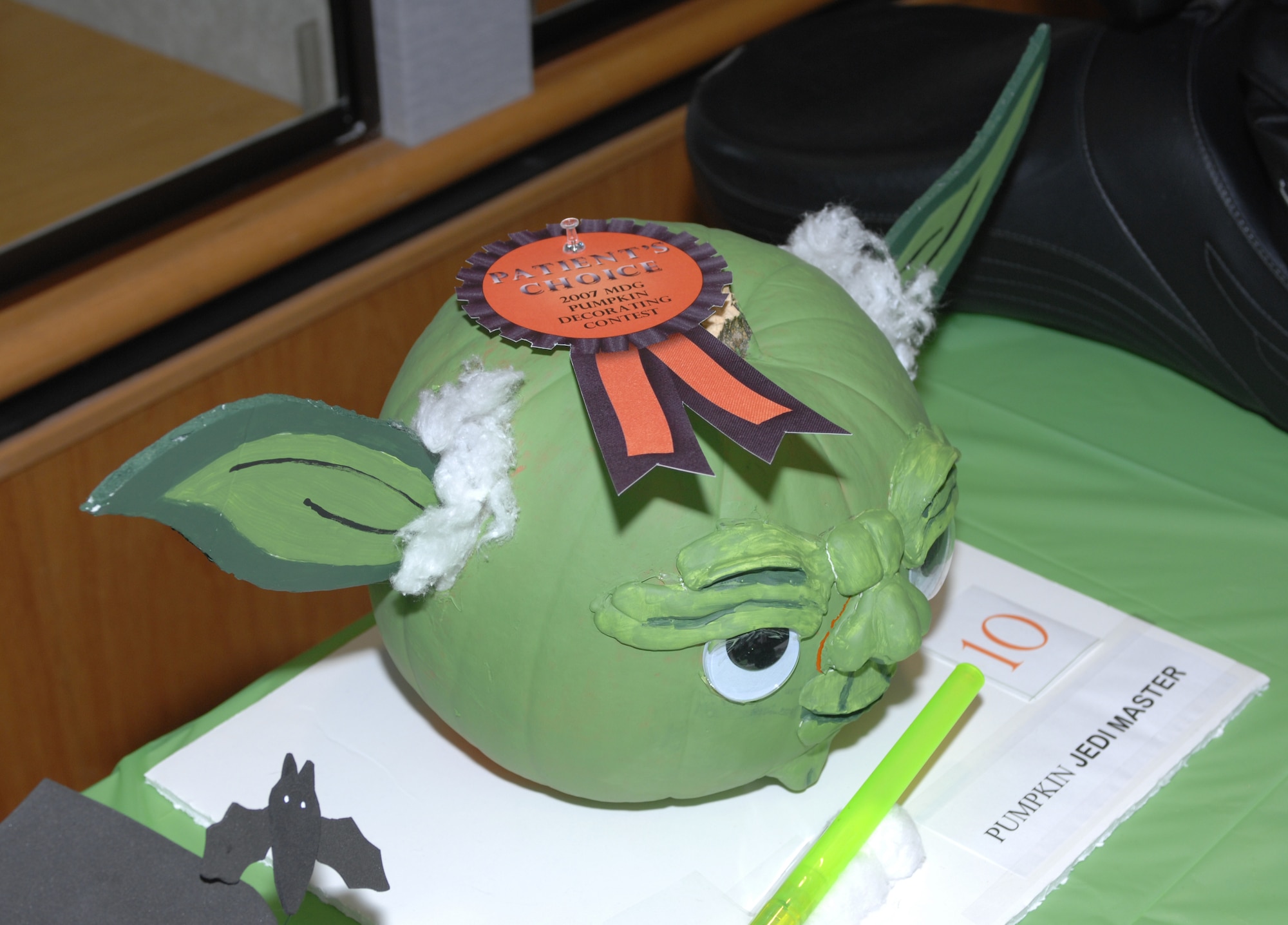 WHITEMAN AIR FORCE BASE, Mo. -- The pumpkin “Jedi Master” designed by the laboratory section won the Patient’s Choice Award during the 509th Medical Group's first-ever pumpkin contest award ceremony Oct. 31. "Jedi Master" received the most votes during the week-long contest. (U.S. Air Force photo/Tech. Sgt. Samuel A. Park)