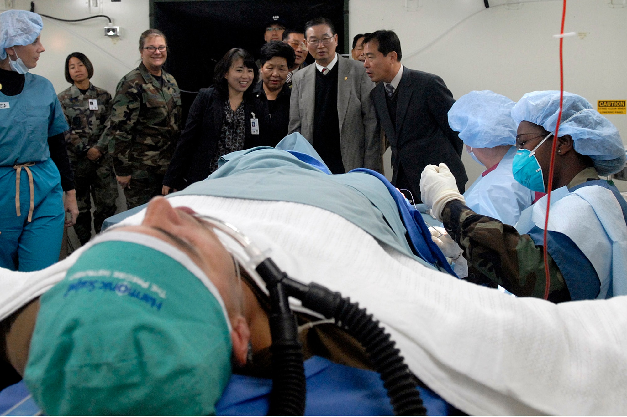 Members of the 944th Medical Squadron deployed from Luke Air Force Base, Ariz., set up a simulated operating room during a Korean host visit Oct. 29 at Kunsan Air Base, South Korea. The Air Force Reserve Command's unit mission is to receive training with the expeditionary medical system 25-bed theater hospital.  (U.S. Air Force photo/Senior Airman Giang Nguyen)