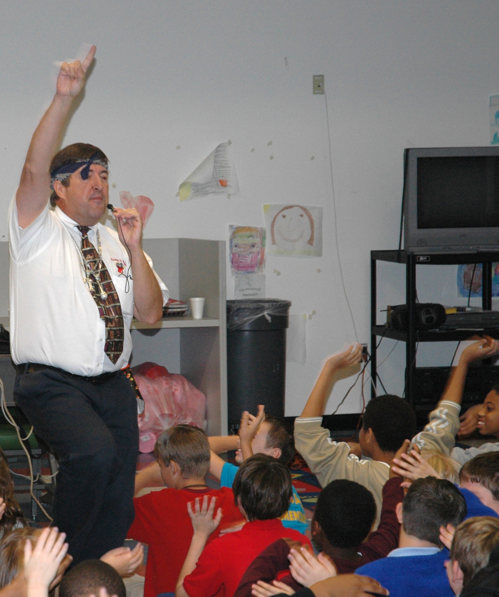 Author Michael Shoulders, performs one of his rap songs during his presentation at Tyndall Air Force Base Elementary School here Oct. 26.  Mr. Shoulders tours the country promoting his books and reading and writing to school children.  (U.S. Air Force photo/Staff Sgt. Timothy R. Capling)