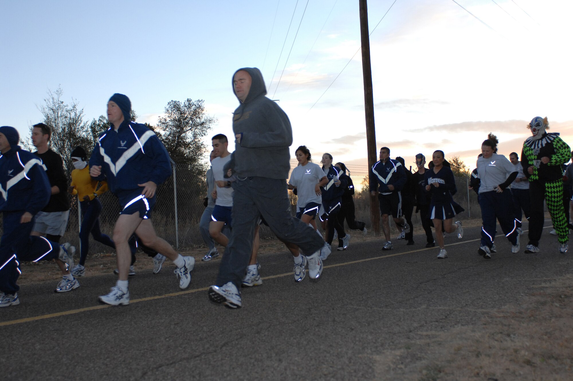 CANNON AIR FORCE BASE, N.M. -- Participants in the Spooky 5K run held here Tuesday get started on the first stretch of the run. Approximately 40 people participated in the run, some of whom ran in full Halloween costumes.(U.S. Air Force photo by Airman 1st Class Evelyn Chavez)