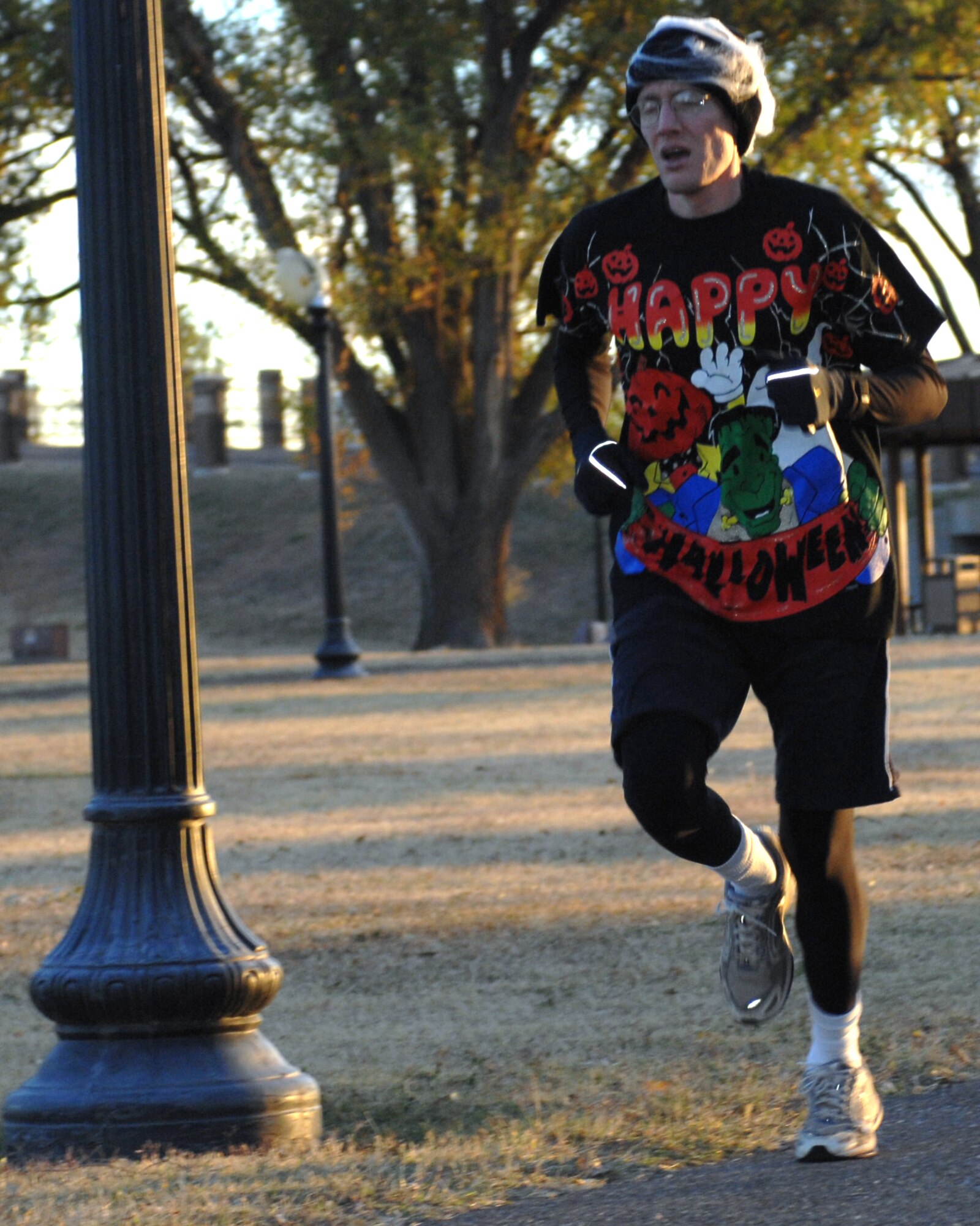 CANNON AIR FORCE BASE, N.M. -- Capt. Andrew Gillman, 27th Special Operations Wing legal office, runs during the Spooky 5K run held here Tuesday. Captain Gillman finished in first place for the males with a time of 19 minutes 3 seconds.(U.S. Air Force photo by Airman 1st Class Evelyn Chavez)