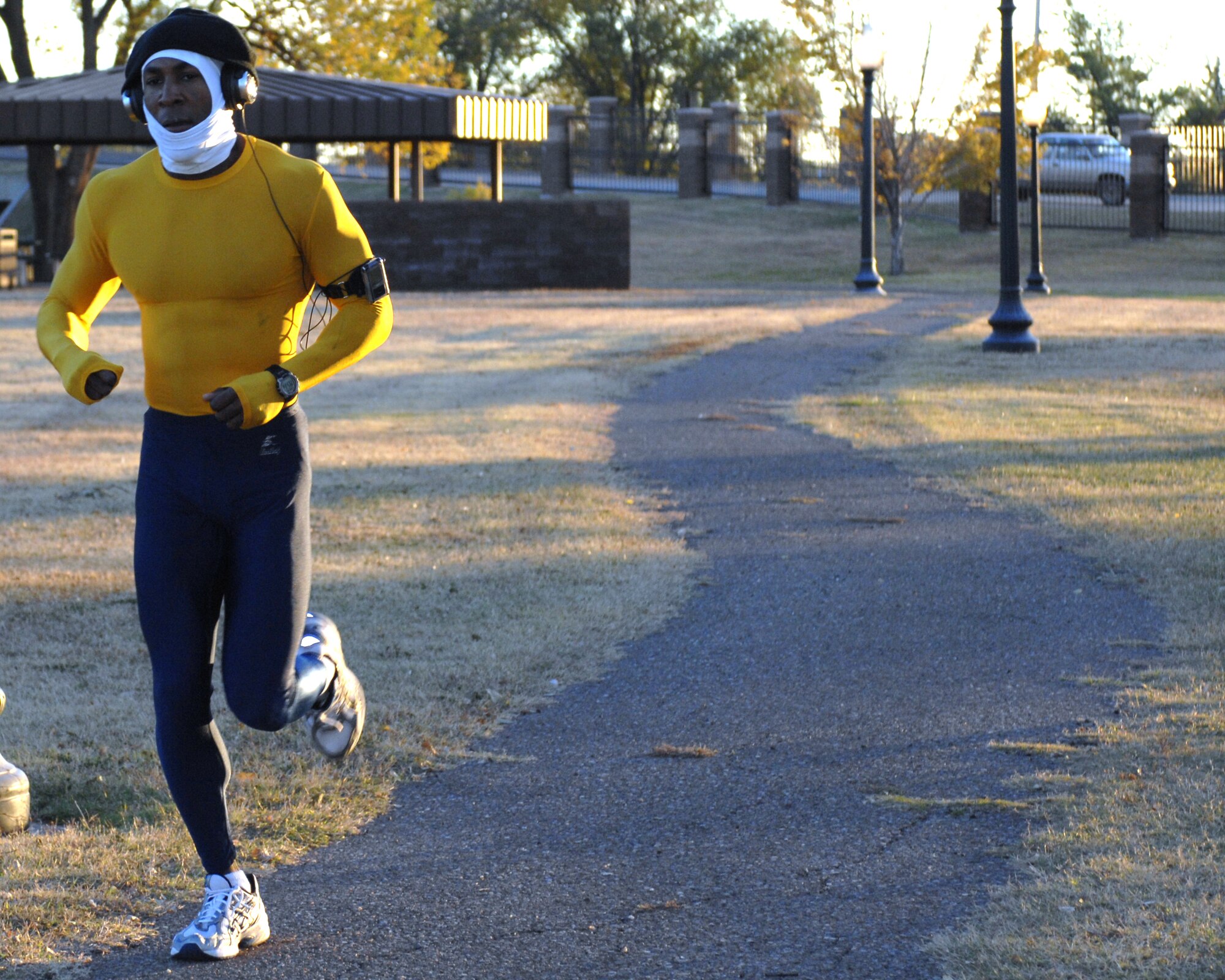 CANNON AIR FORCE BASE, N.M. -- Staff Sgt. Eric Schmidt, 27th Special Operations Civil Engineering Squadron, dressed as a muscle-builder, finishes out the last stretch of the Spooky 5K run held here Tuesday. Sergeant Schmidt finished the race in second place.(U.S. Air Force photo  by Airman 1st Class Evelyn Chavez)