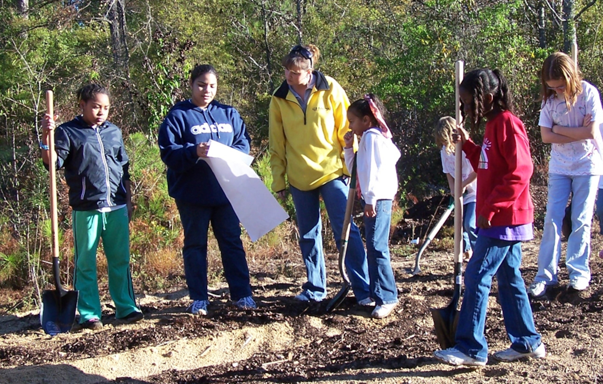 Volunteers planted flowers around the Butterfly Gardens at the SAC Lake nature trails Oct. 20 in celebration of National Public Lands Day. (U.S. Air Force photo)