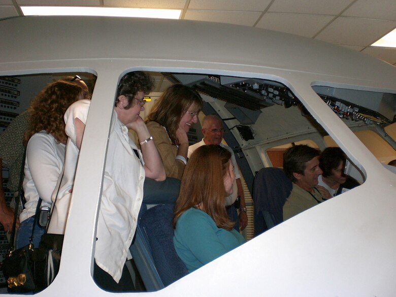 Local civic leaders get an inside look at a C-17 Globemaster III during a civic leader tour to Charleston Air Force Base, S.C. Oct. 5. The civic leaders were flown to the base on an MC-130E Combat Talon I aircraft.  Influential leaders from the surrounding community are invited once a year to see other Reserve installations to promote their understanding and support of the Air Force mission. (U.S. Air Force Photo/Leslie Henderson)