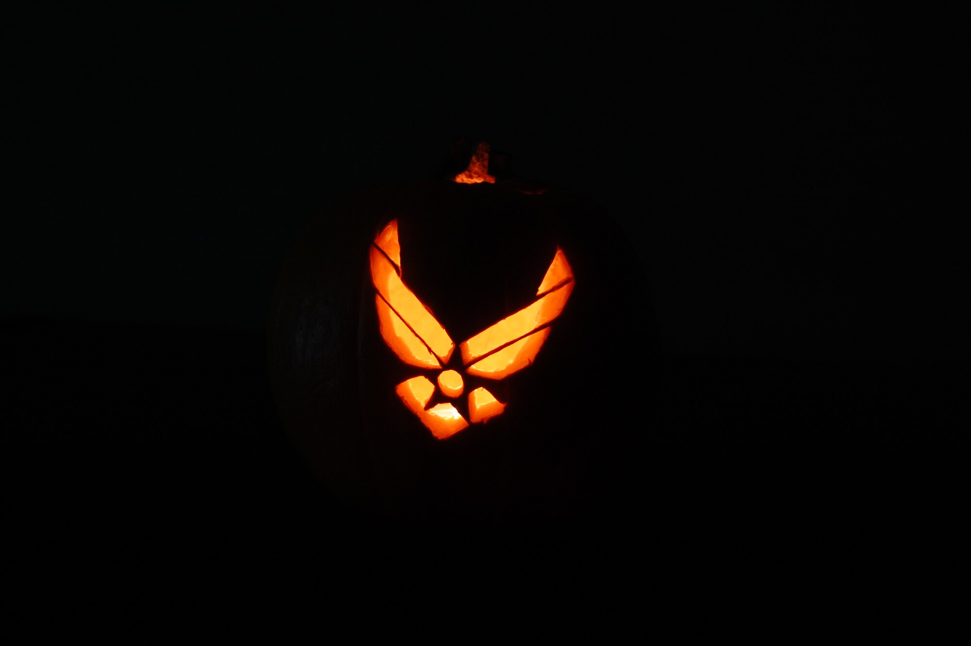 SOUTHWEST ASIA -- Airmen from the 43rd Expeditionary Electronic Combat Squadron decorated a pumpkin with the Air Force emblem Oct. 30 to help celebrate Halloween at an undisclosed location. 