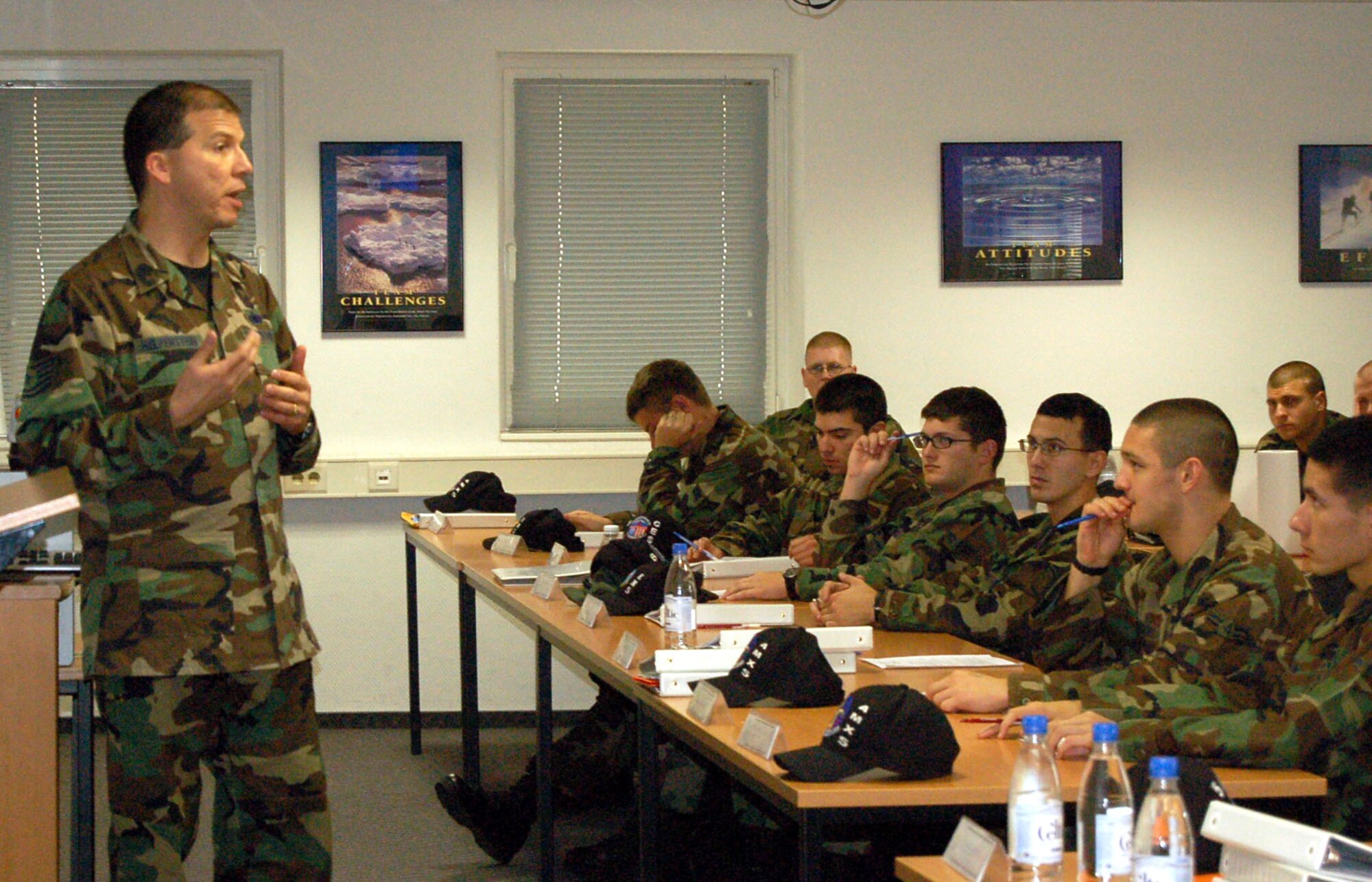 Tech. Sgt. Ryan Helfenstein, 52nd Mission Support Squadron, briefs Airmen at the First Term Airman Center about the deployment process and their responsibilities. The 52nd Fighter Wing will host to the first-ever U.S. Air Forces in Europe Career Assistance Advisor /First Term Airman Center Conference at Spangdahlem Air Base Nov. 16–17. (U.S. Air Force photo/Staff Sgt. Tammie Moore)